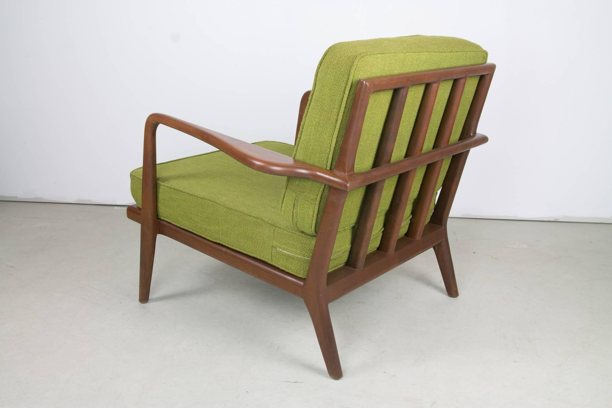 An original production WAC rail back lounge chair by Mel Smilow in natural finish solid walnut with original fabric upholstery.