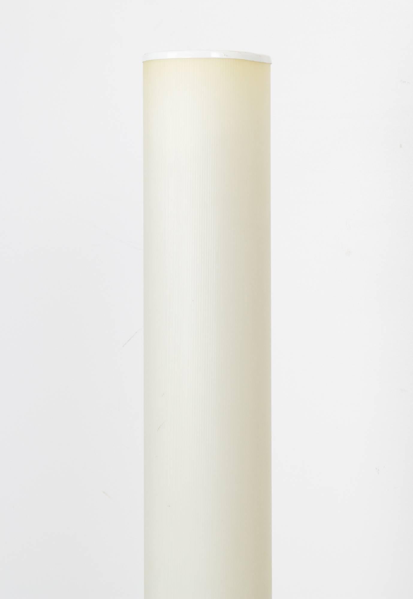 Monolithic, cylindrical floor lamp by Bill Curry for 'Design Line' series, with heavy iron base and corrugated plastic shade.