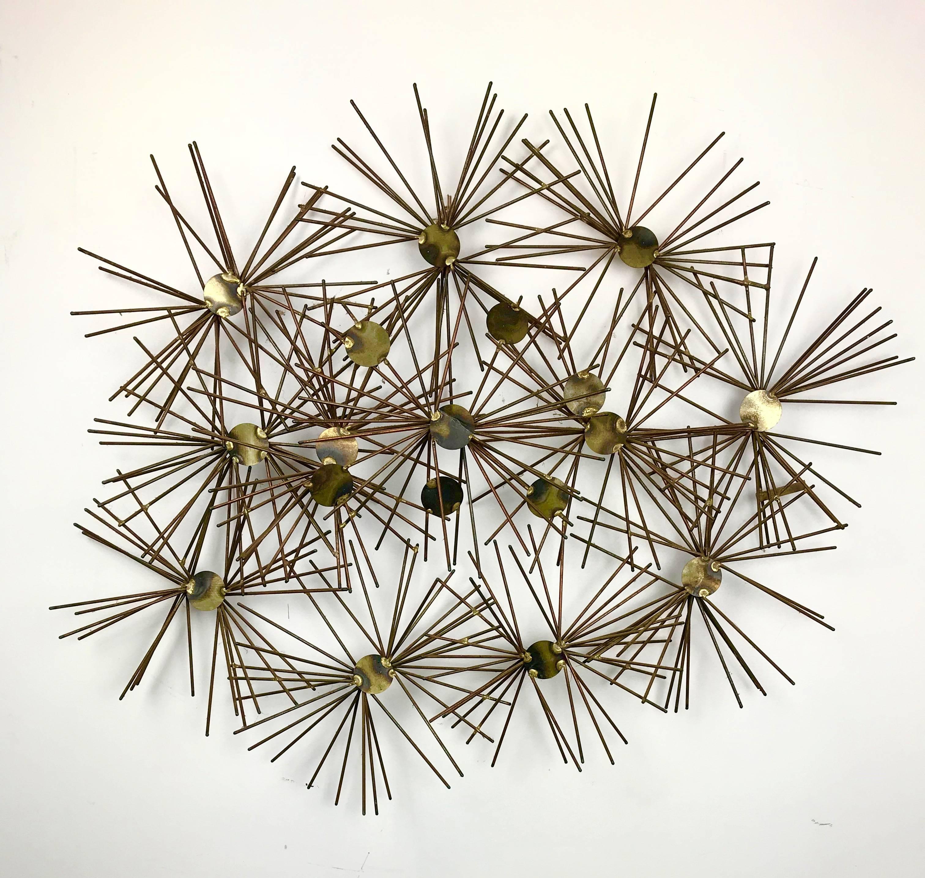 This is a great looking mixed metal (copper and brass) torch welded wall sculpture. Well crafted and with a lot of energy this piece makes a strong statement in any setting.