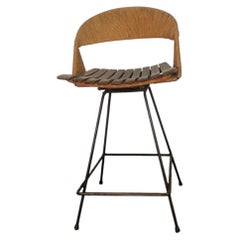 Sgabello da bar girevole “Iron & Rush” di Arthur Umanoff