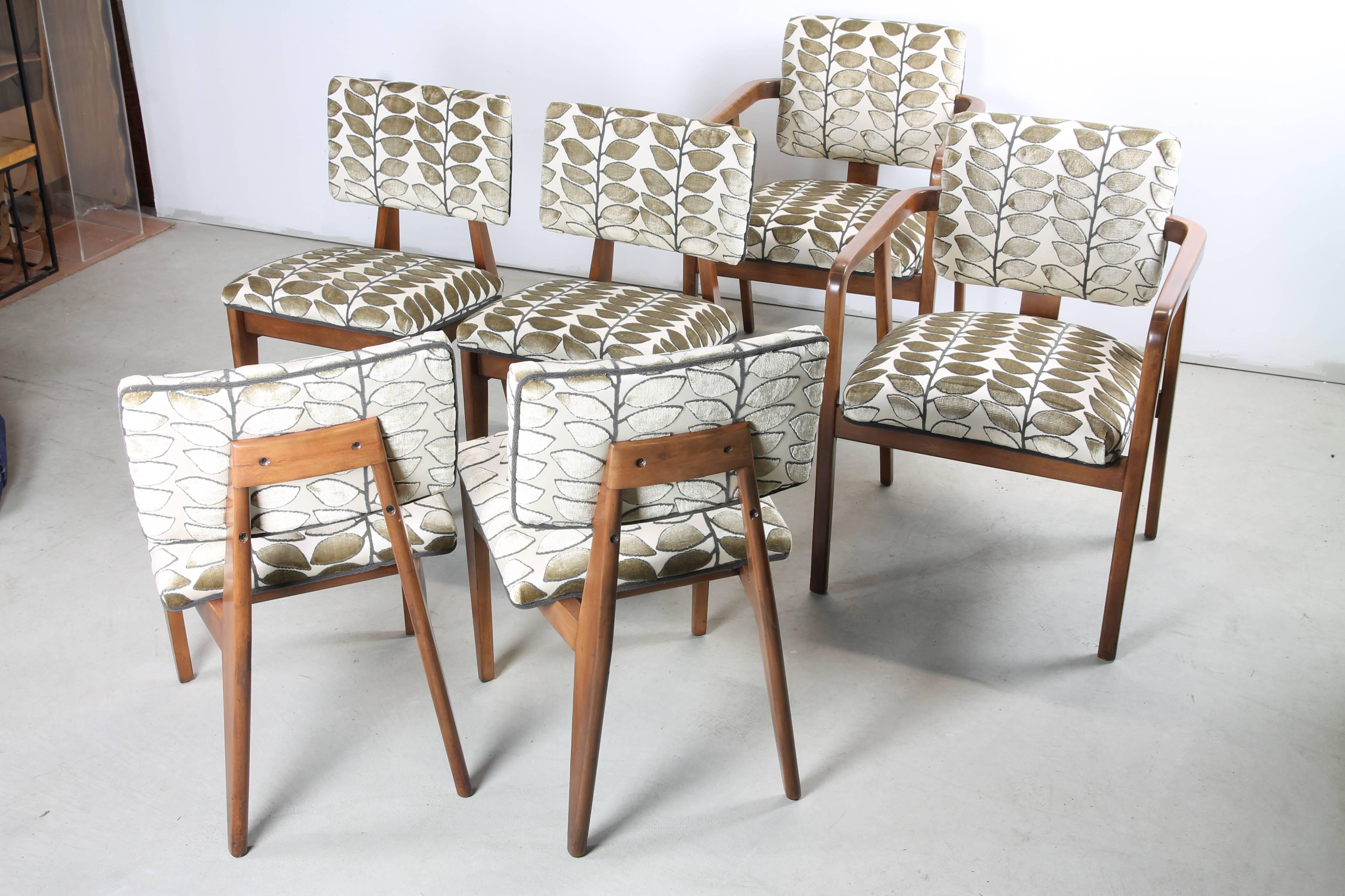 A stunning set of six mahogany dining chairs by Earnest Farmer with George Nelson & Associates for Herman Miller. Included are four side chairs and two armchairs.