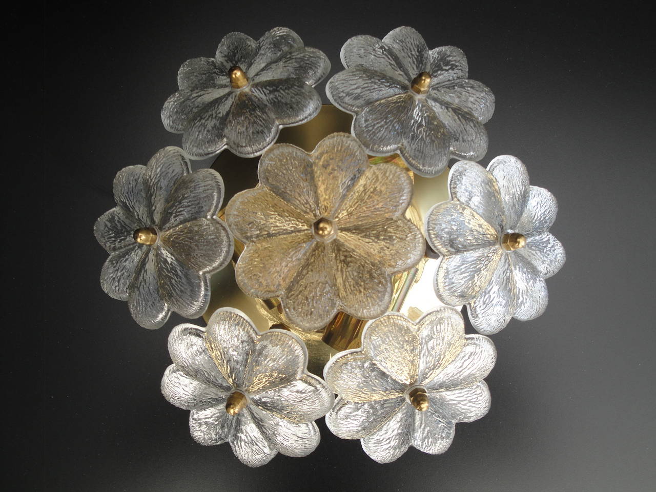 Small Ernst Palme floral glass flush mount sconce. Rewired for USA. Requires three E14 base up to 40 watt bulbs.
Also available in X Large, Large and Medium sizes.


Offered at Gallery Girasole in North Hollywood.