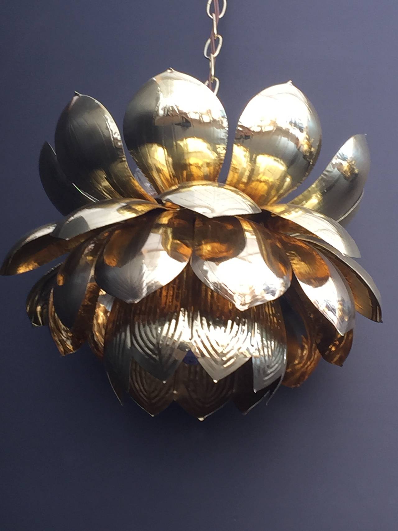 Large brass lotus pendant light by Feldman.
