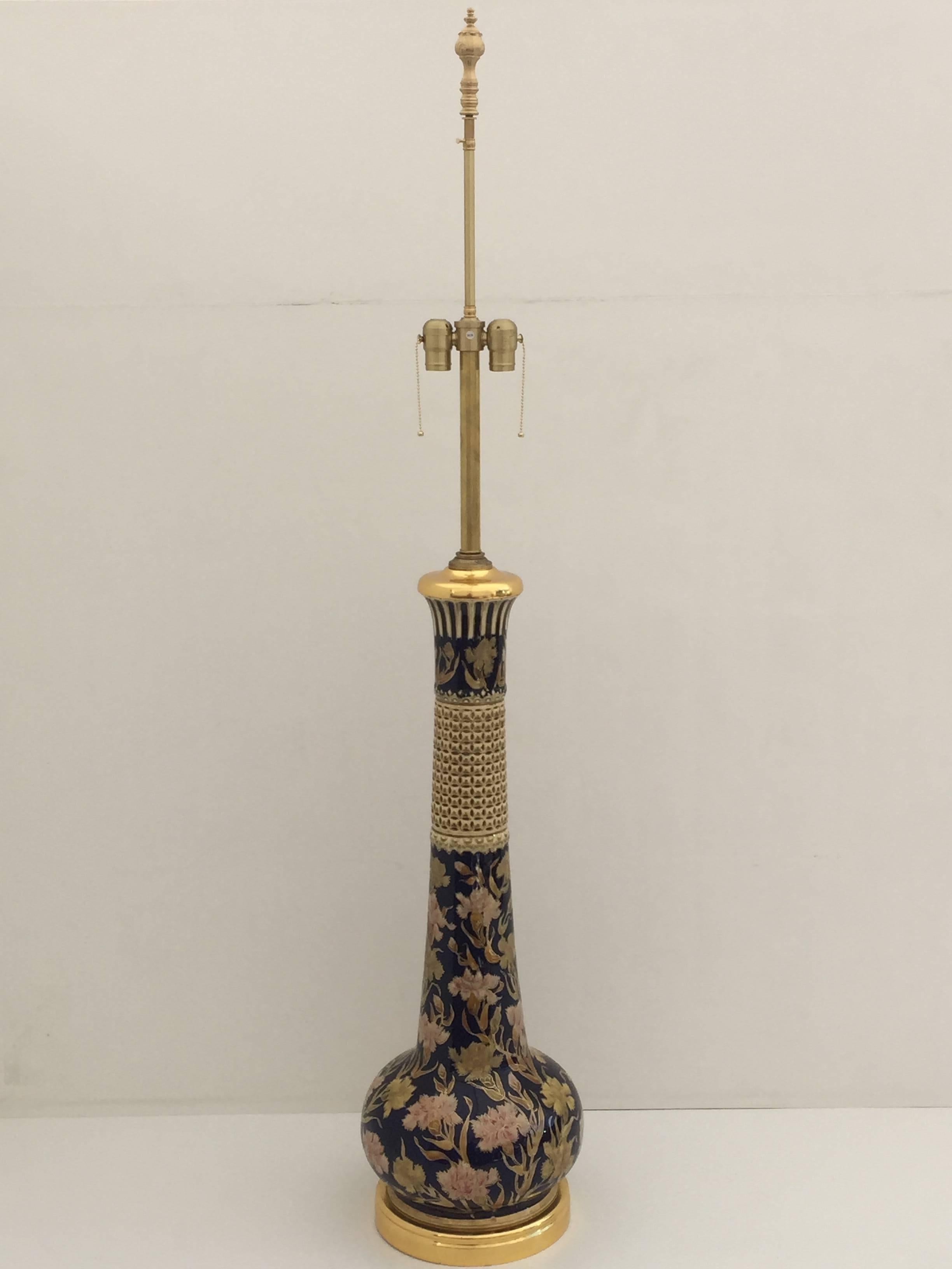 Giant ceramic and 24-karat gold leaf lamp with Islamic floral design.
Just ceramic part itself is 32" tall.