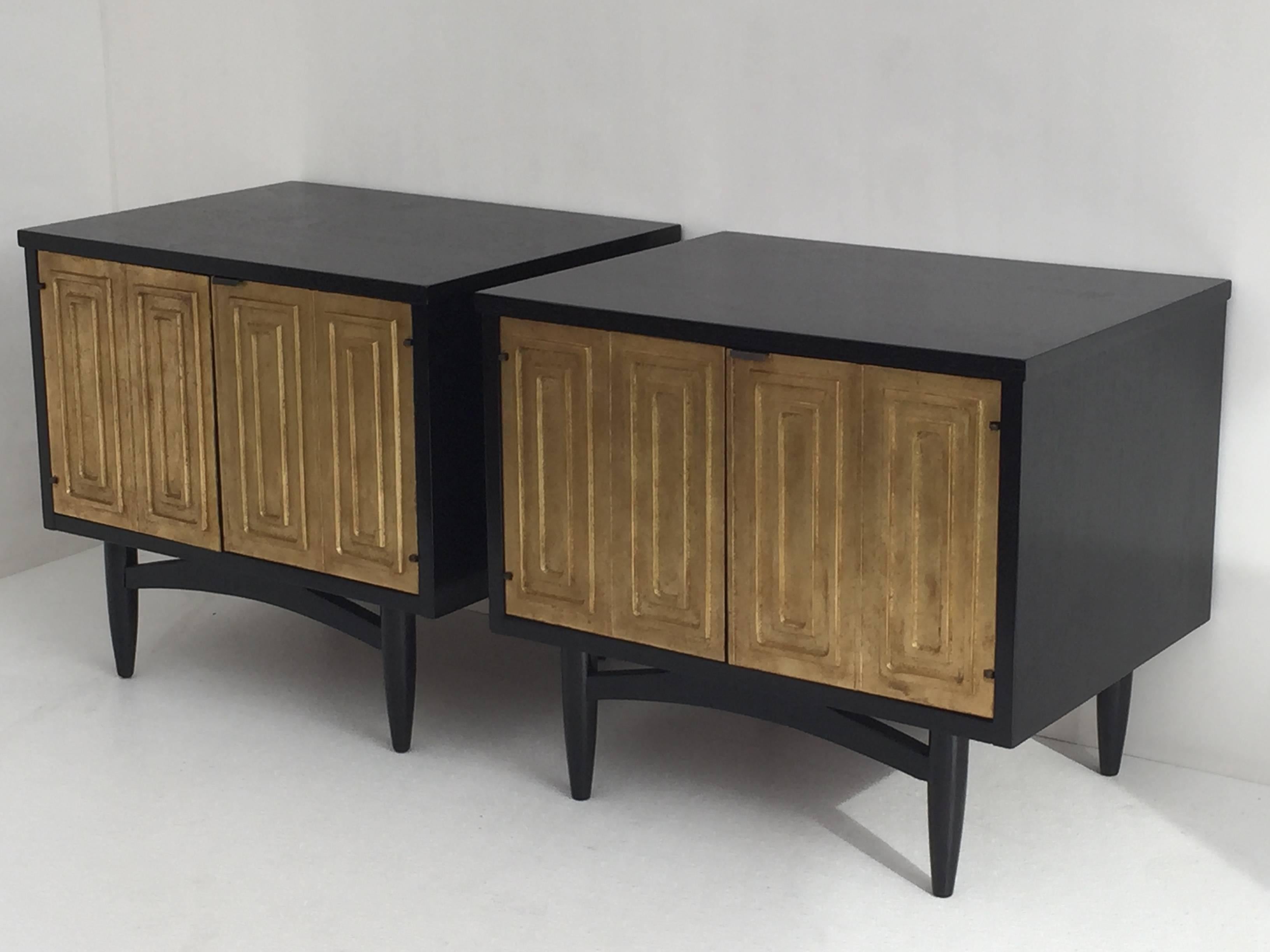 Pair of mid century modern petite ebonized and gold leafed nightstands