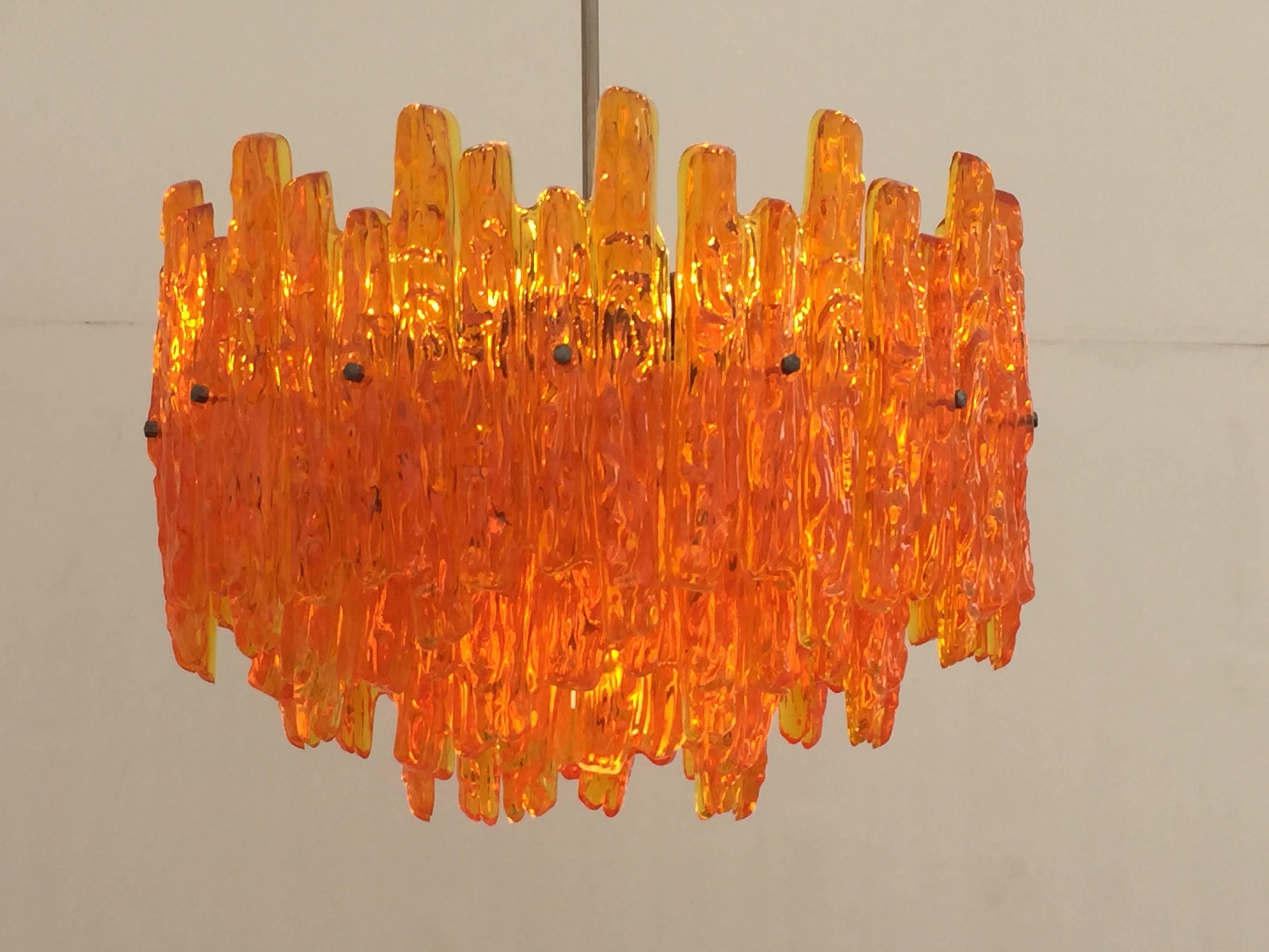 Pretty orange acrylic icicle chandelier in the manner of Kalmar.