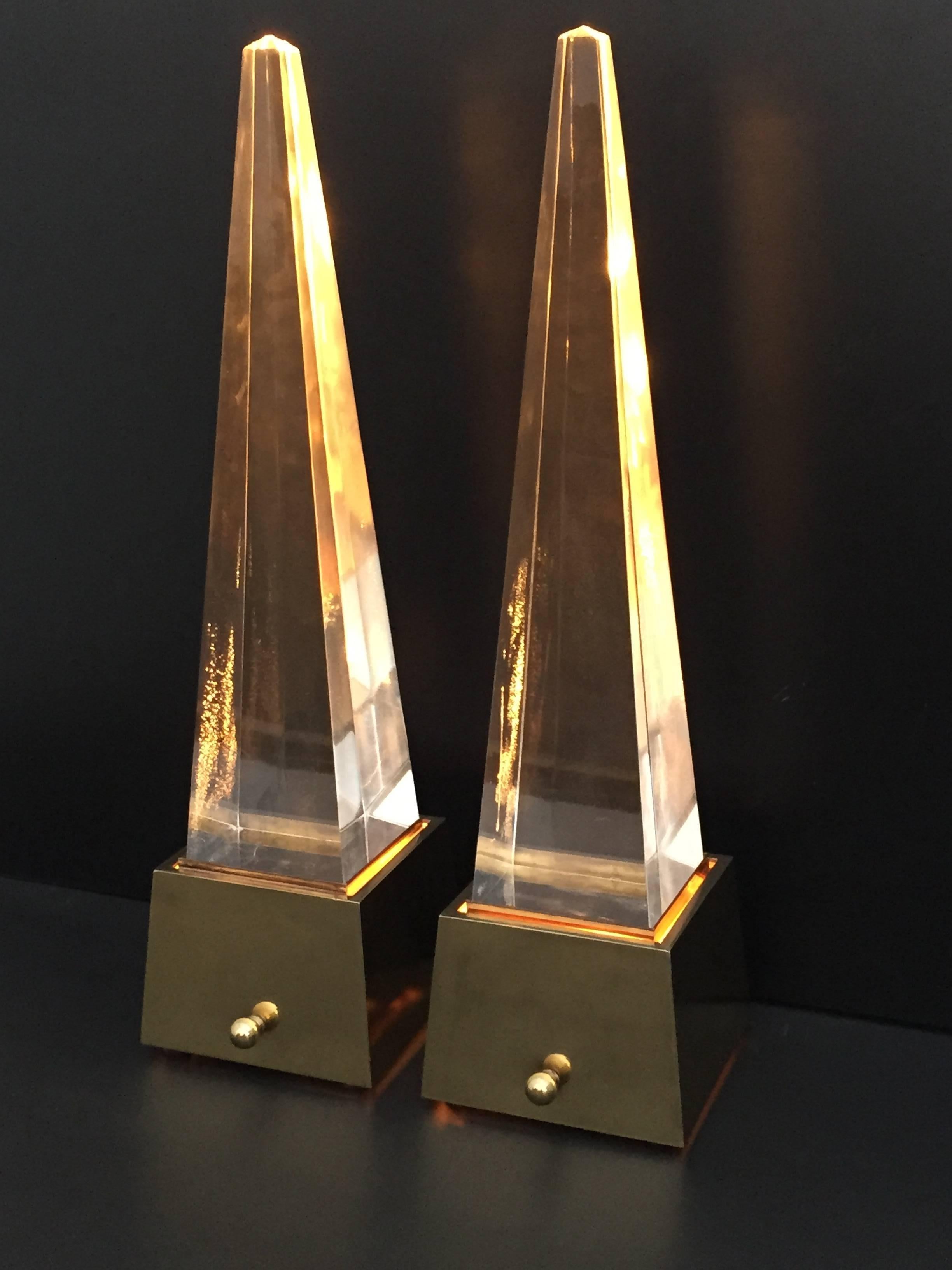 Pair of glamorous brass and lucite pyramid lamps.

