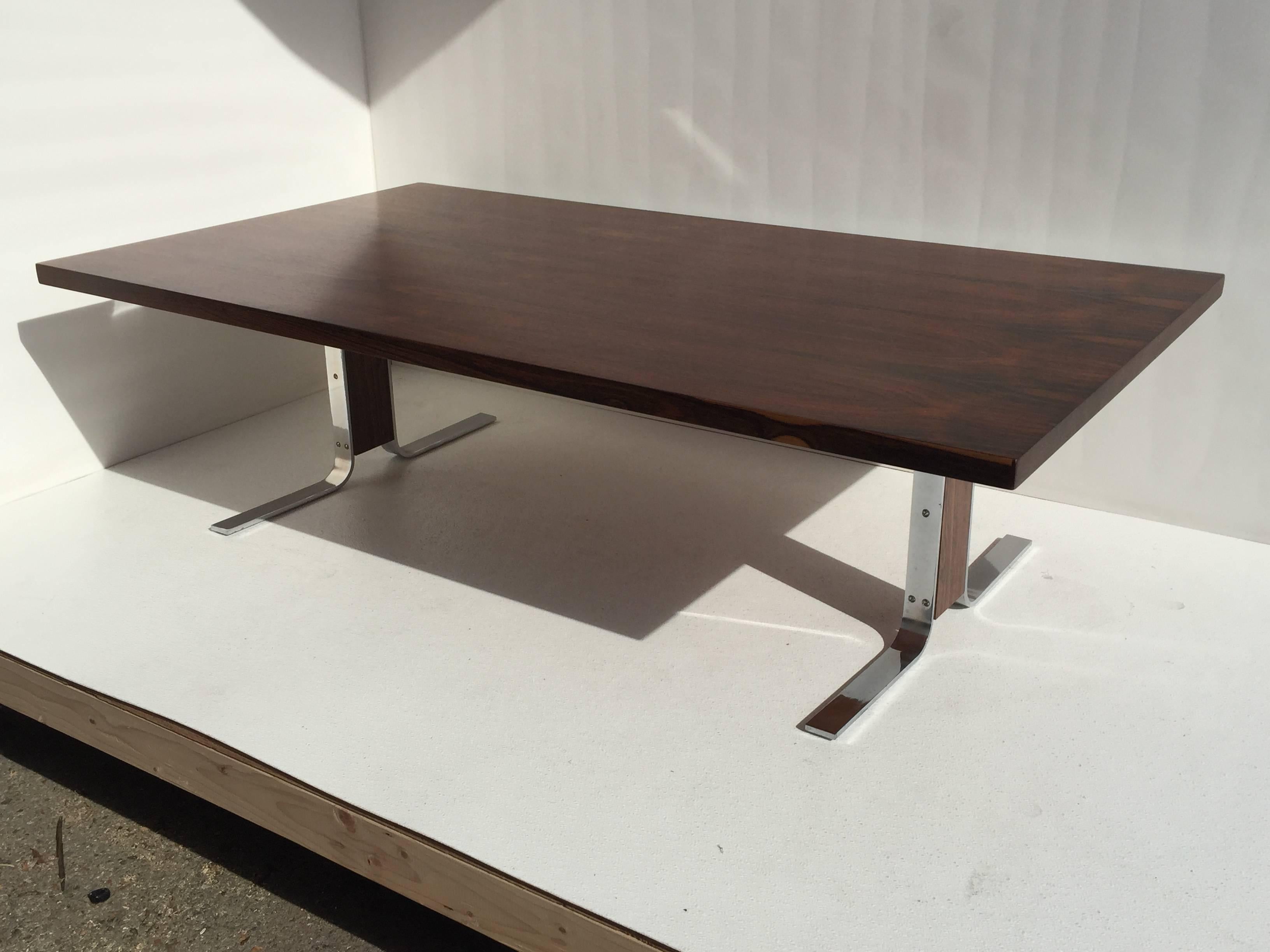 Milo Baughman attributed rosewood and chrome coffee table.