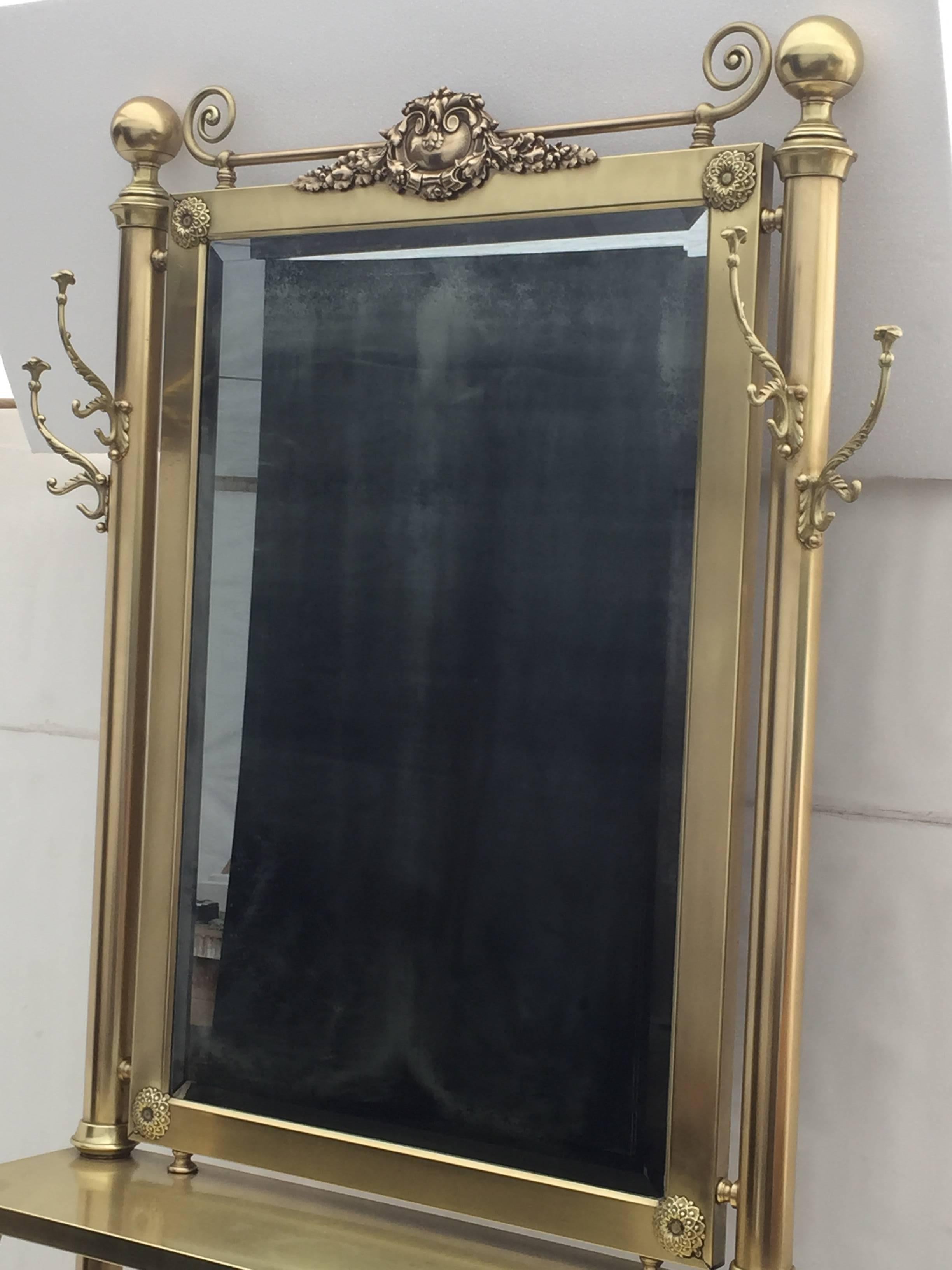 Neoclassical brass hall tree mirror, coat hanger and console table.
