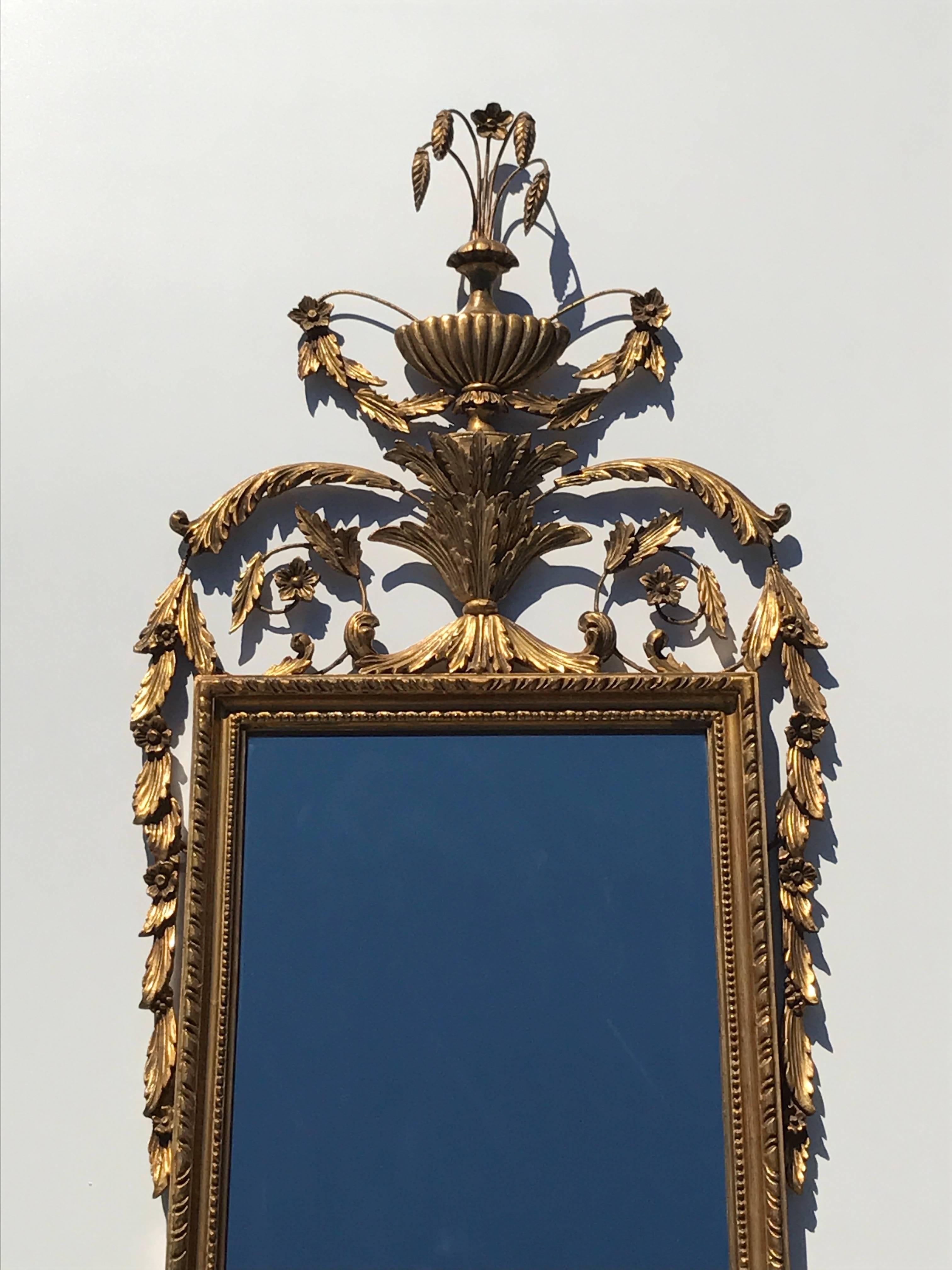 Gold leafed Hollywood Regency wall mirror attributed to Labarge.