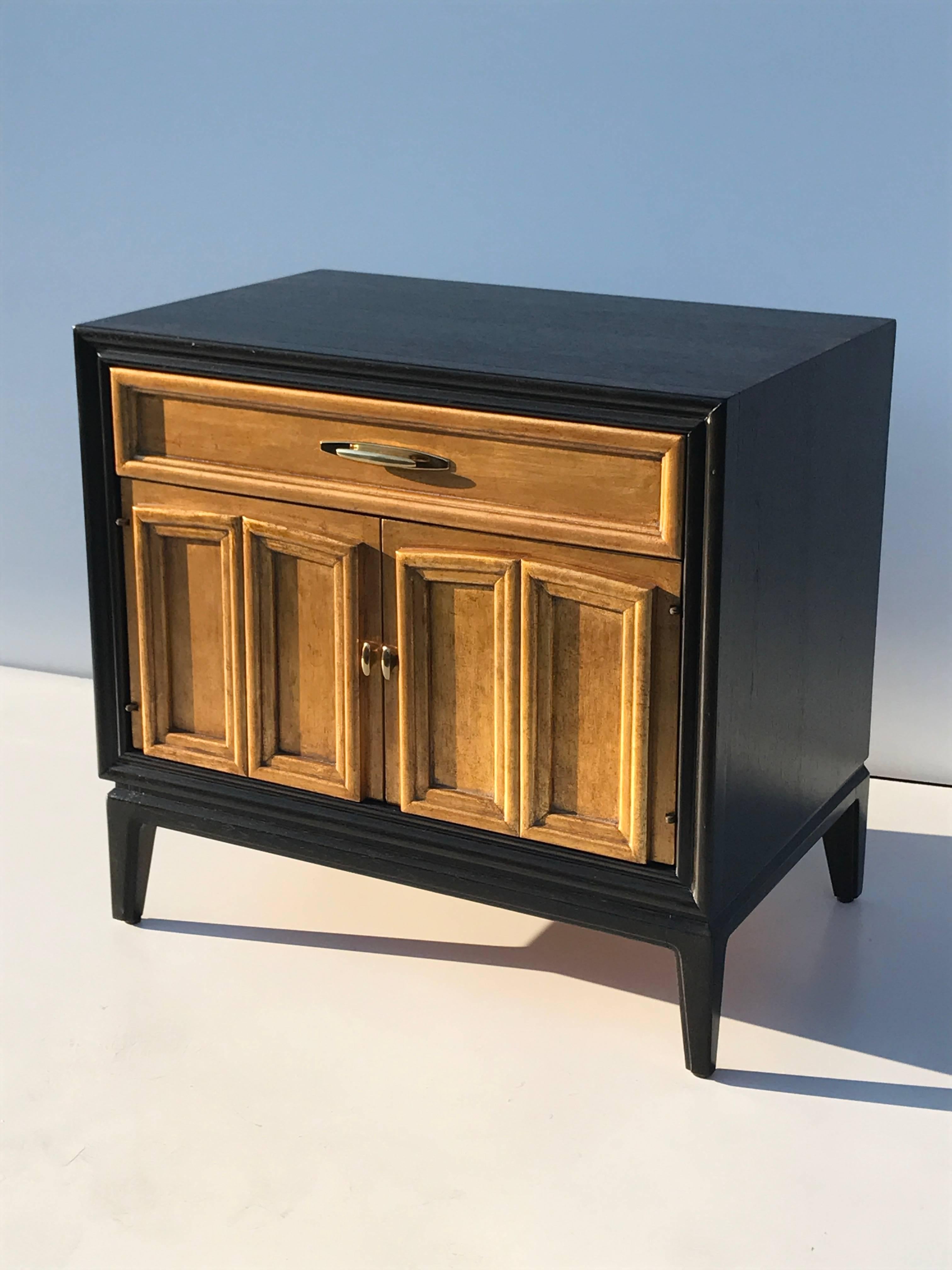 Hollywood Regency Pair of Ebonized and Gold Leafed Nightstands