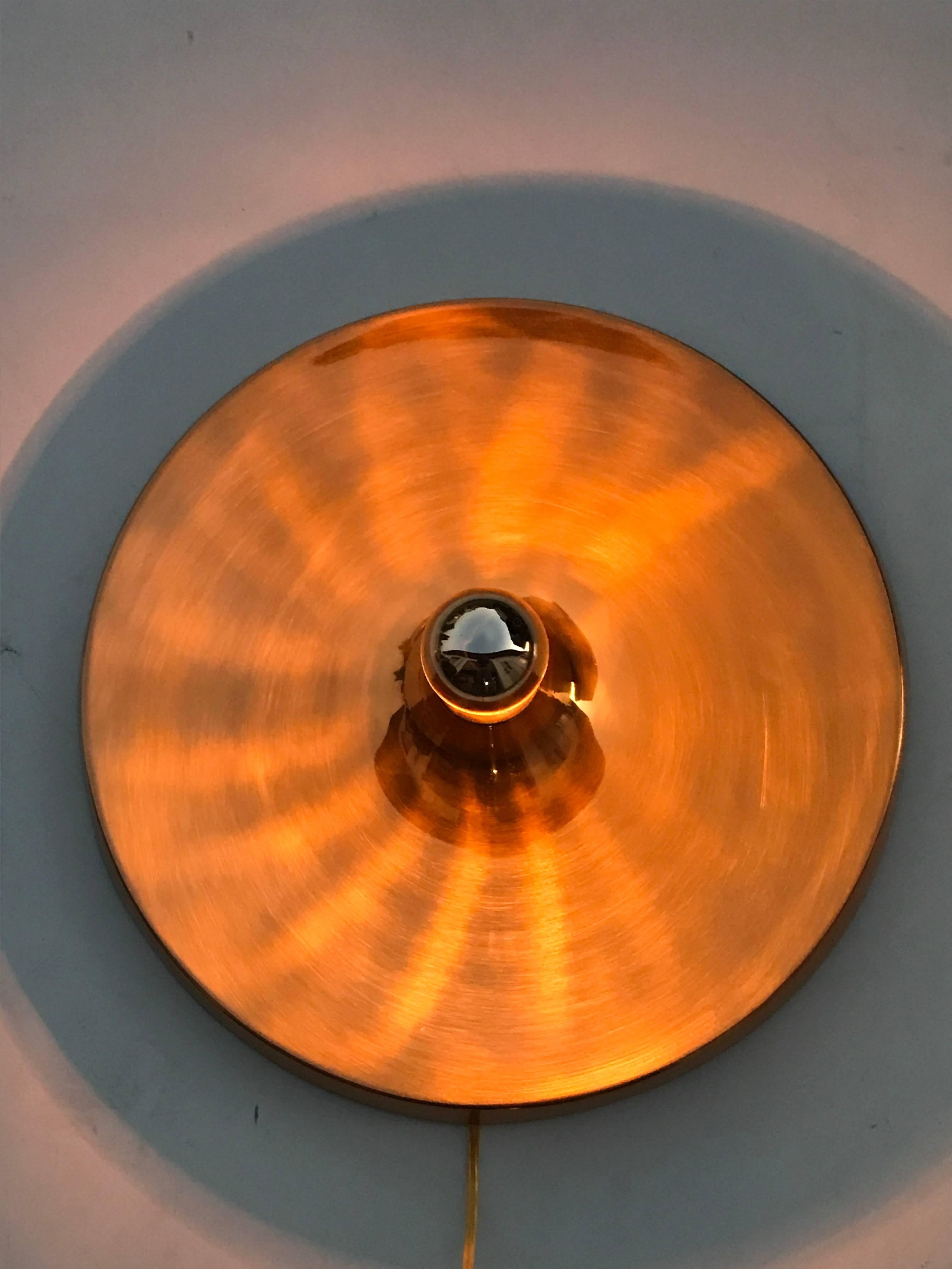 German flush mount aluminium disk lights in anodized gold.
