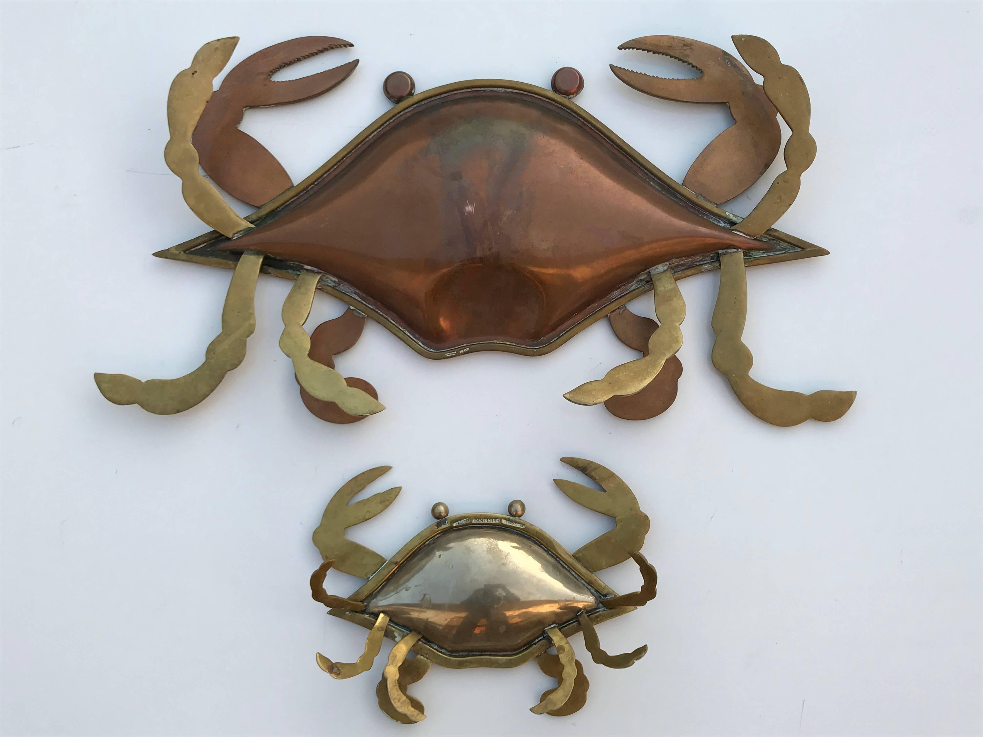 Brass crab mother and baby sculpture or platter attributed to Los Castillos
Measures: Small crab is 9.5 inches wide, 7 inches deep and 2 inches high.