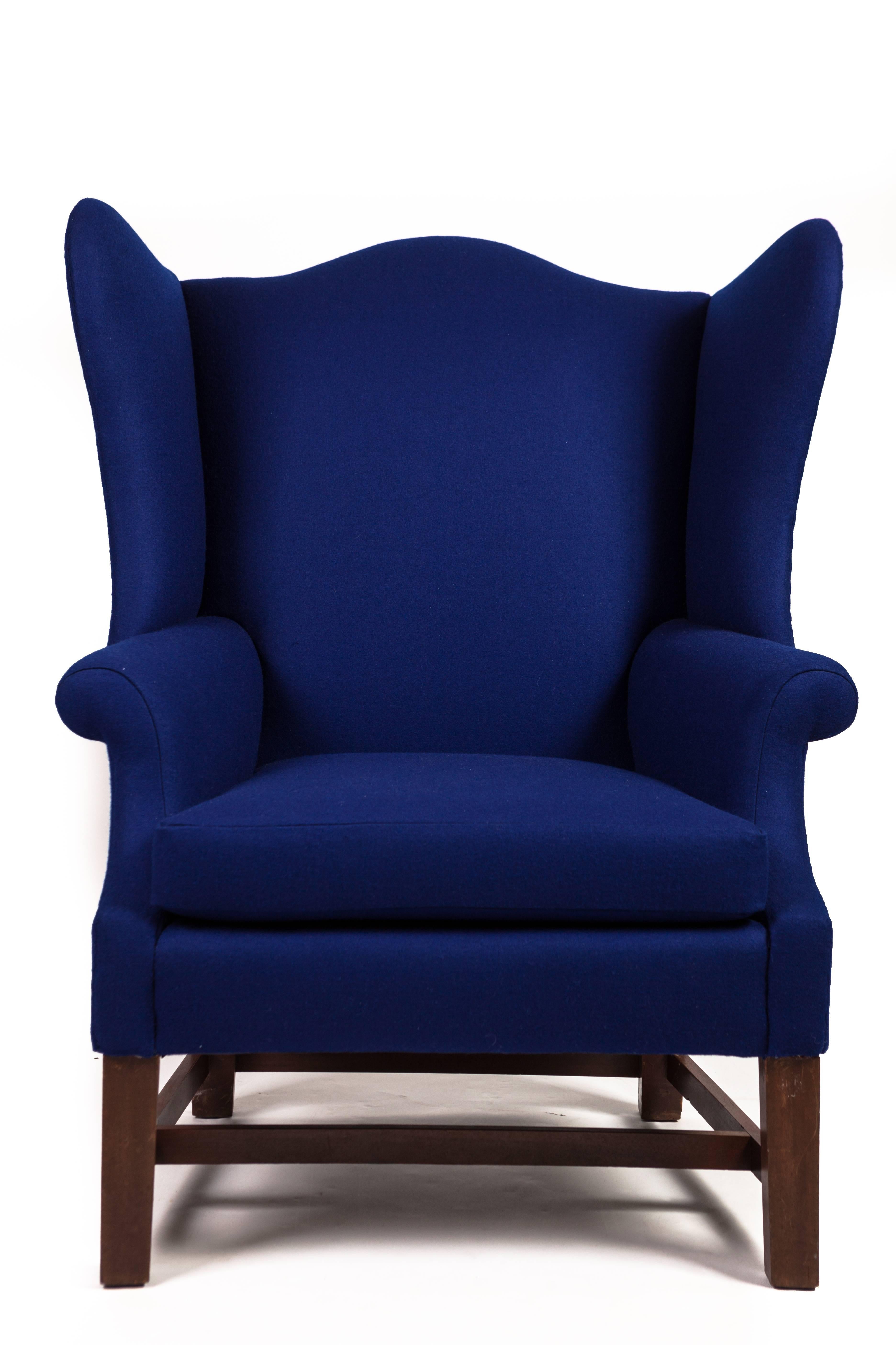 George III style wingback armchair. Newly upholstered in blue felt.