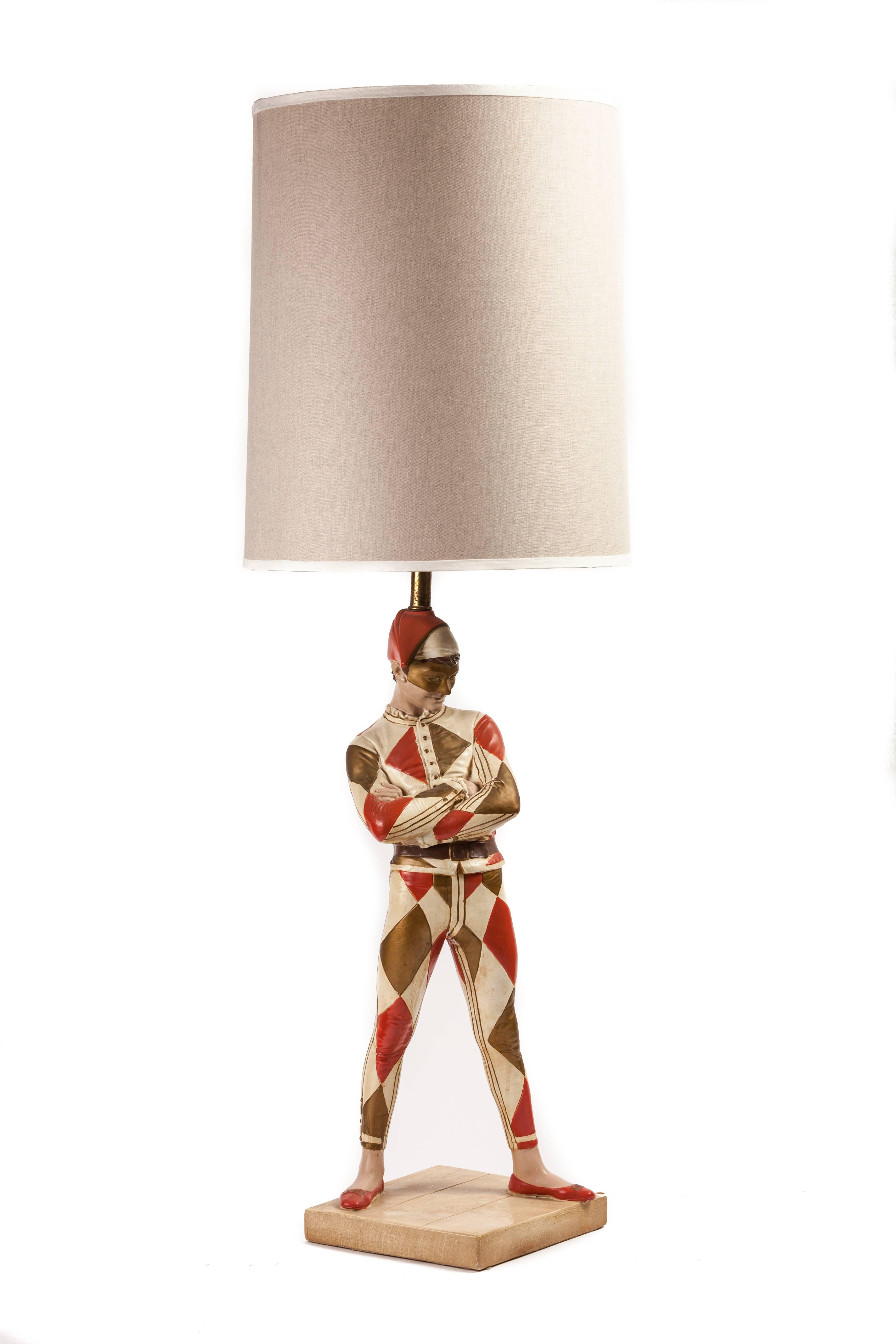 Created by the Marbro lamp company of Los Angeles. The Harlequin; made of plaster and modeled after a famous bronze sculpture by Rene de St Marceaux (1845-1915), called 