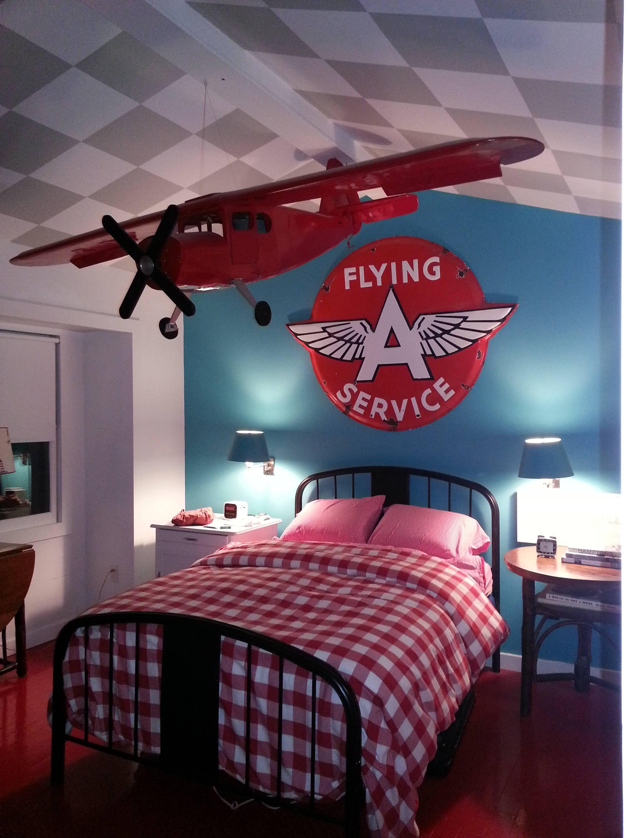 Beautiful large-scale model airplane in a bright red lacquer.