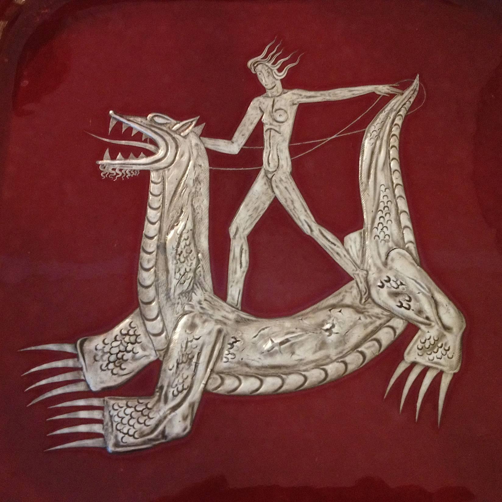 Rare Argenta plate in red glaze with silver dragon-rider.
Signed 
