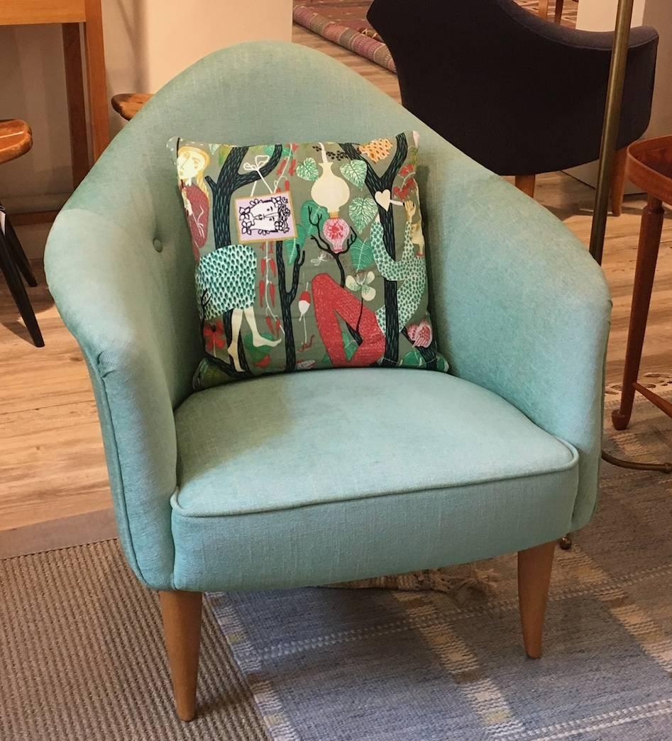 Lila Adam chair designed by Kerstin Ho¨rlin-Holmquist for NK Triva series, Paradiset collection, in 1956-1957.
The chairs are newly reupholstered with a wool-velvet fabric of highest quality in a turquoise-beige. The feet are made of beech wood.
