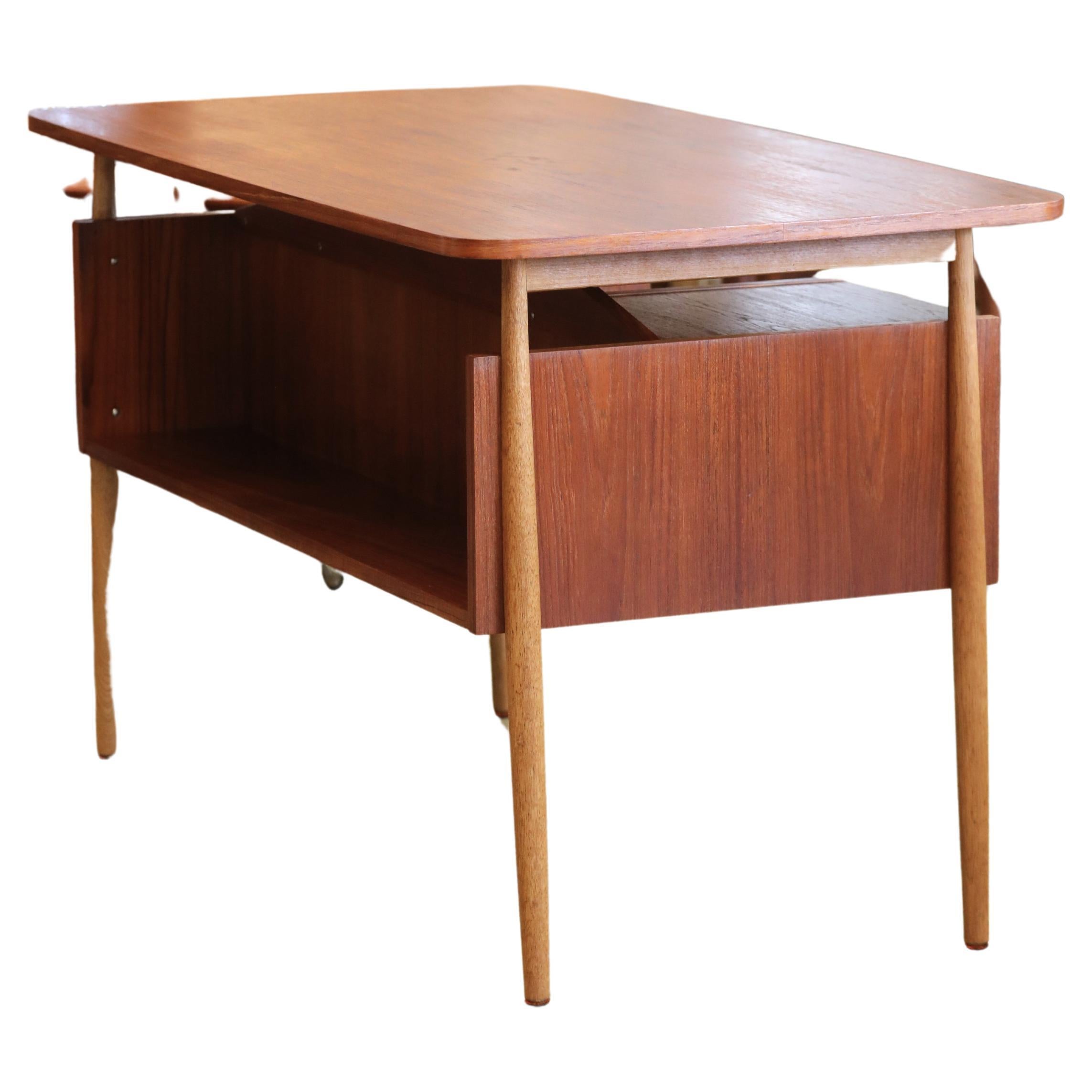 An exquisitely elegant and timeless desk with many fine details and as usual with the Danes, it is done with finesse!

The desk is freestanding and was designed by Gunnar Nielsen for Danish Tibergaard. The desk has four drawers with neat handles on