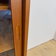 Danish teak cabinet with sliding glass doors, 1960s