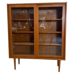 Danish teak cabinet with sliding glass doors, 1960s