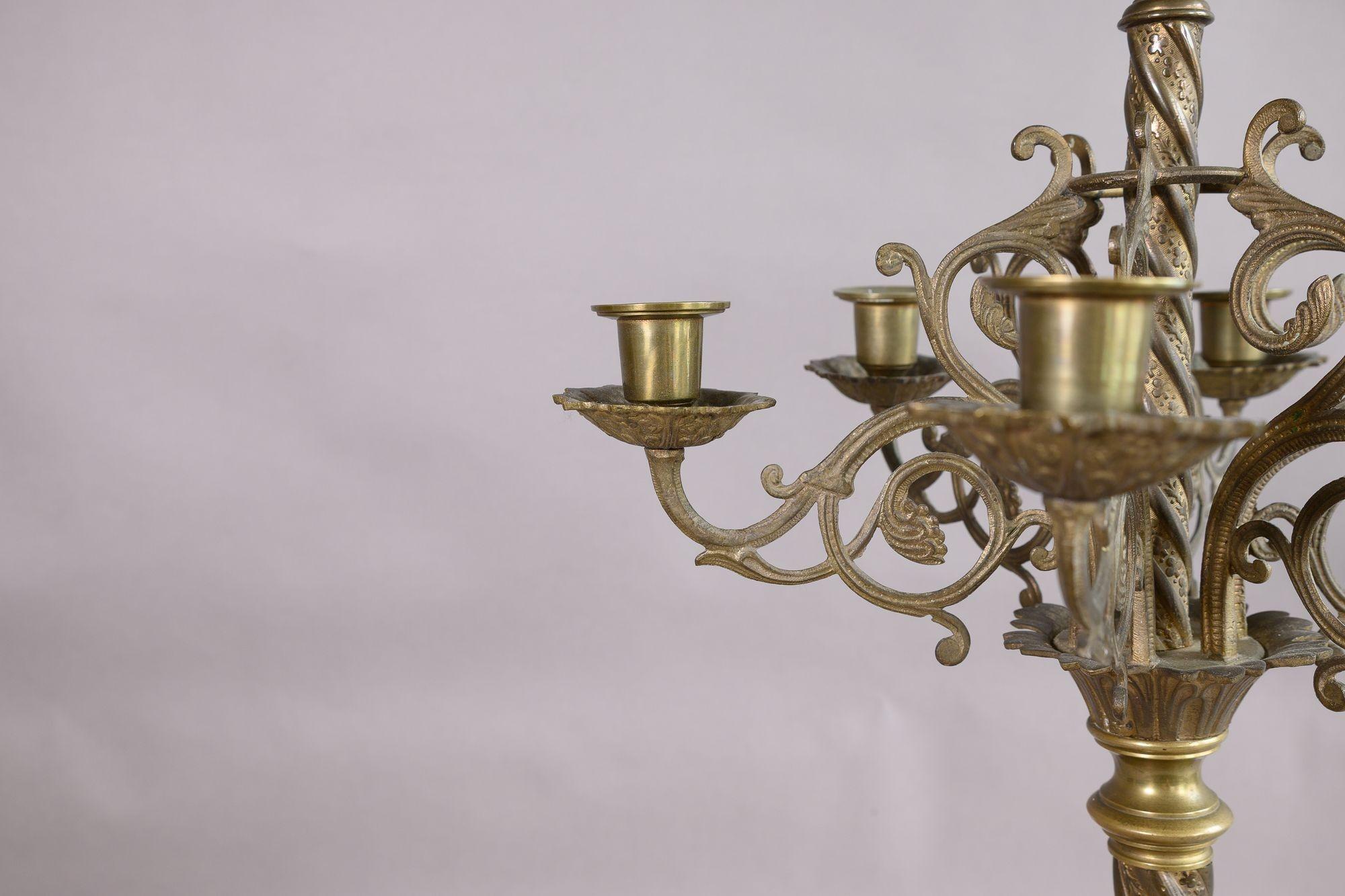 Pair of six branch church candle holders in brass. Circa 1920

H 61cm x W 34cm x D 34cm