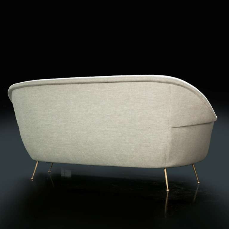 Elegant Italian sofa with brass legs reupholstered in linen.