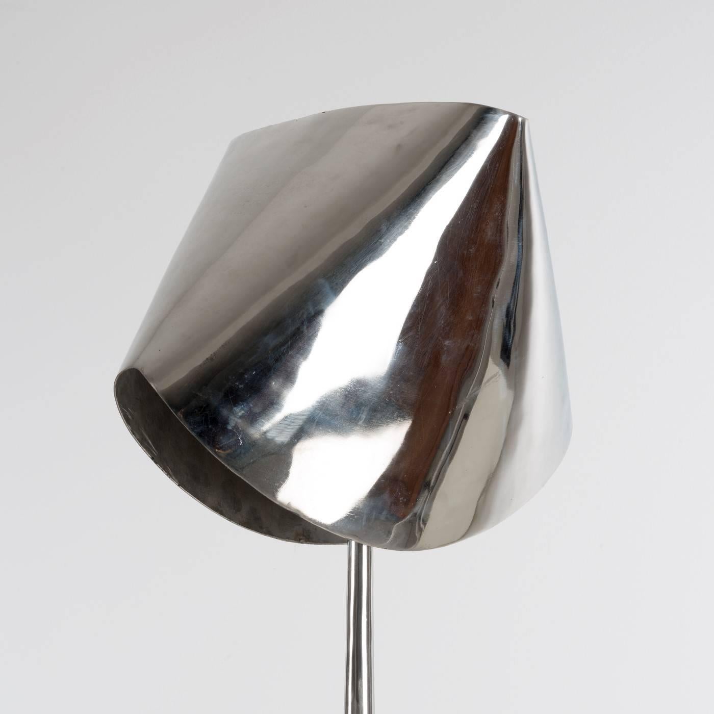 Polished metal floor lamp by Philippe Hiquilly. Signed PH.
Hiquilly was born in 1925 in Paris, France, to a decorator father and a painter mother, Hiquily was introduced to art at a very young age, assisting sculptors such as Despiau, and attended