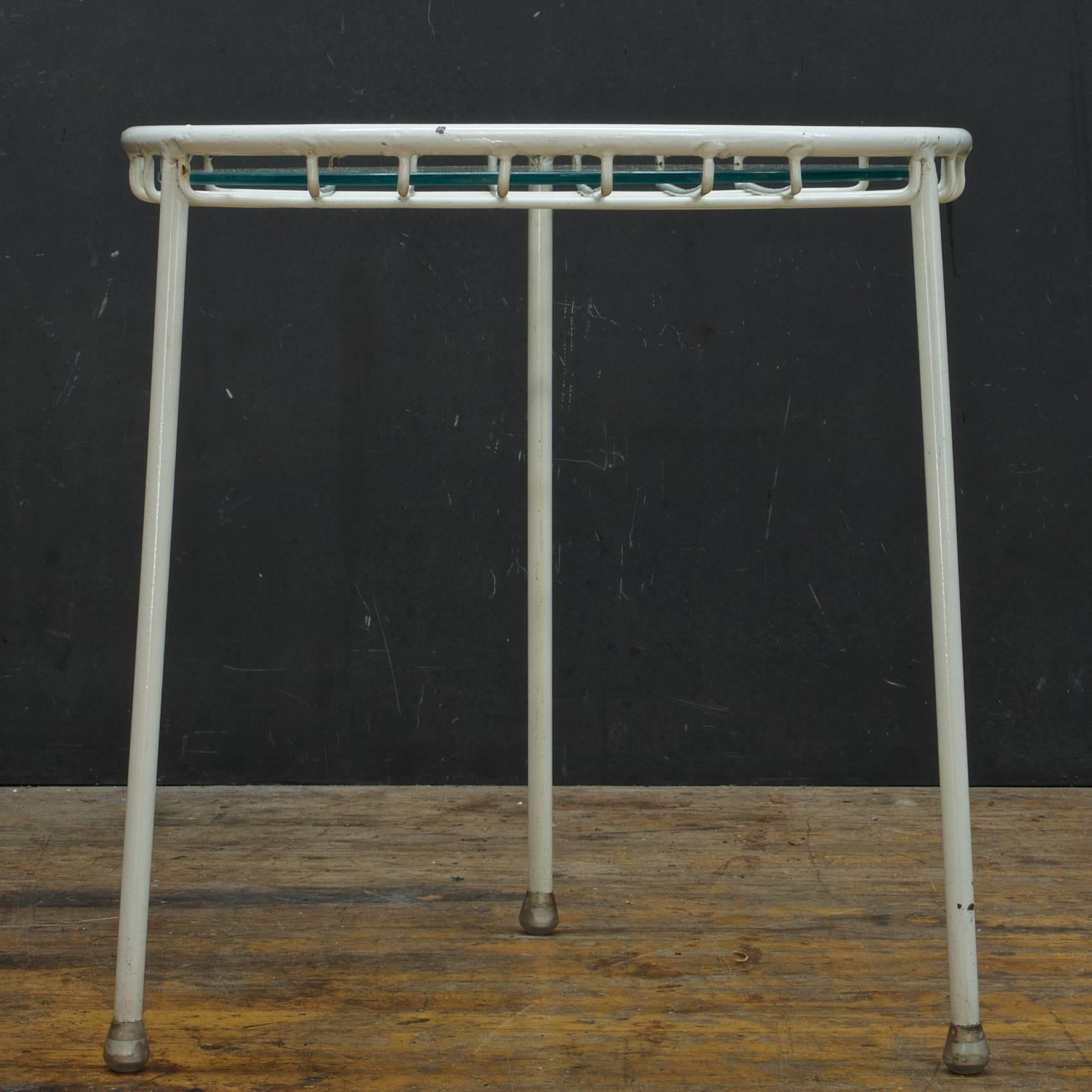 Extremely Rare Three Leg Round Design. Can be used with a glass top as show and included as a table, or with a cushion as a stool, however, there is no cushion included. It was only produced in 1951.