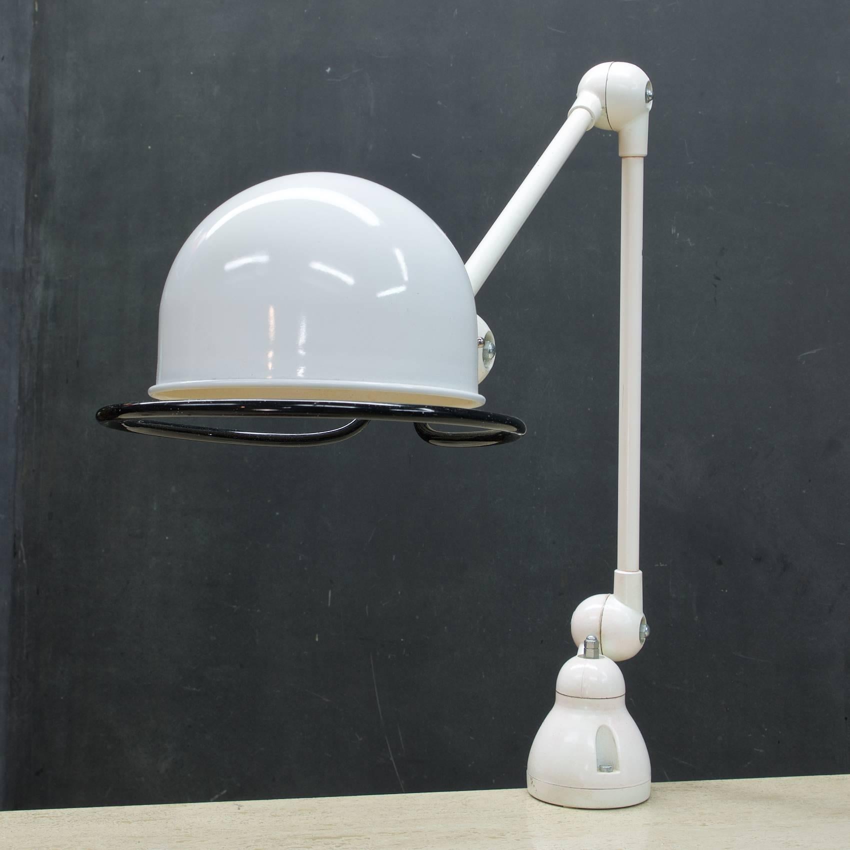 Two-armed French Industrial drafting task lamp. The Jielde lamp was designed in the 1950s by Jean-Louis Domecq, two arms each 15.7