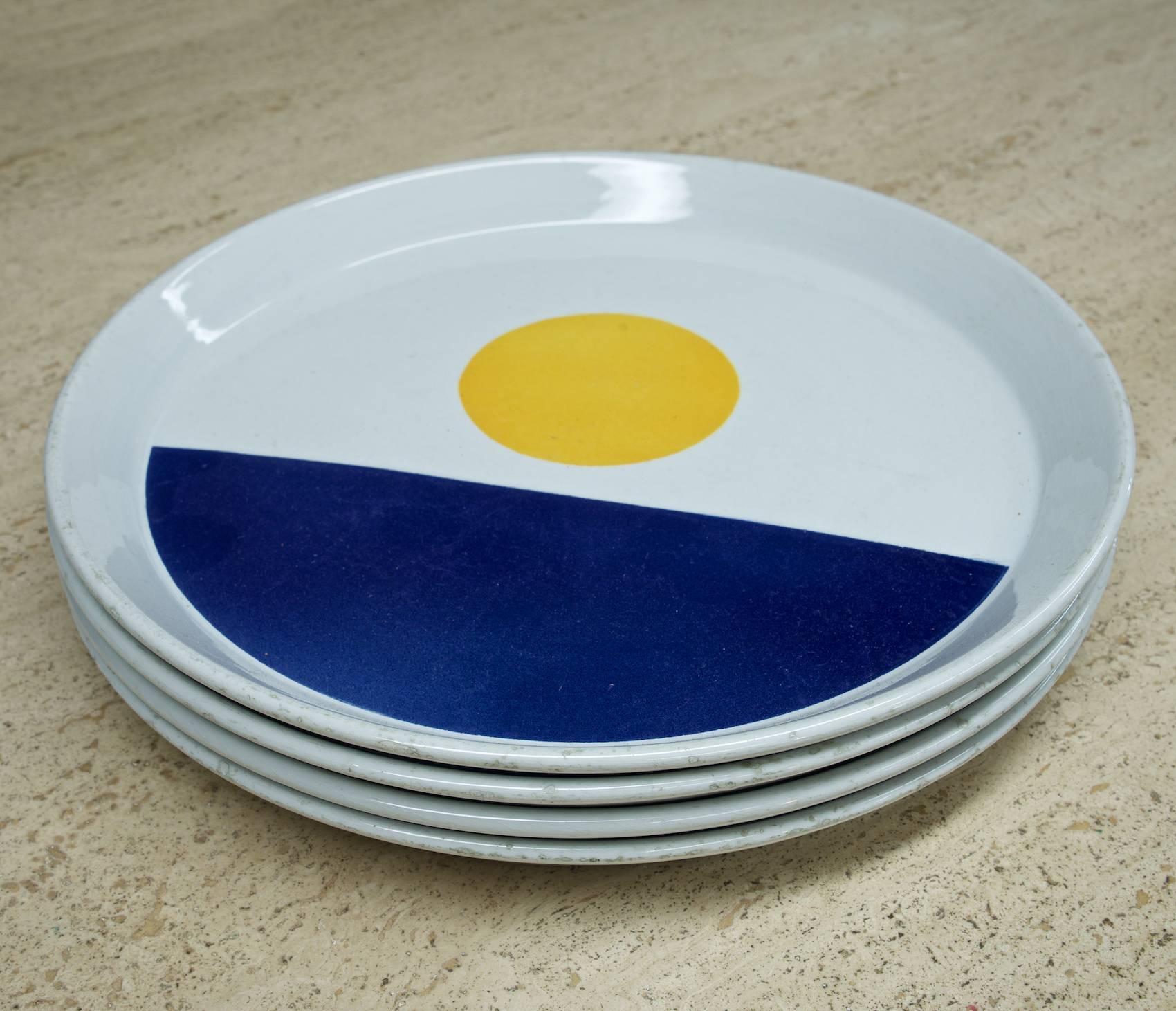 Rare set of four colorful ceramic plates.