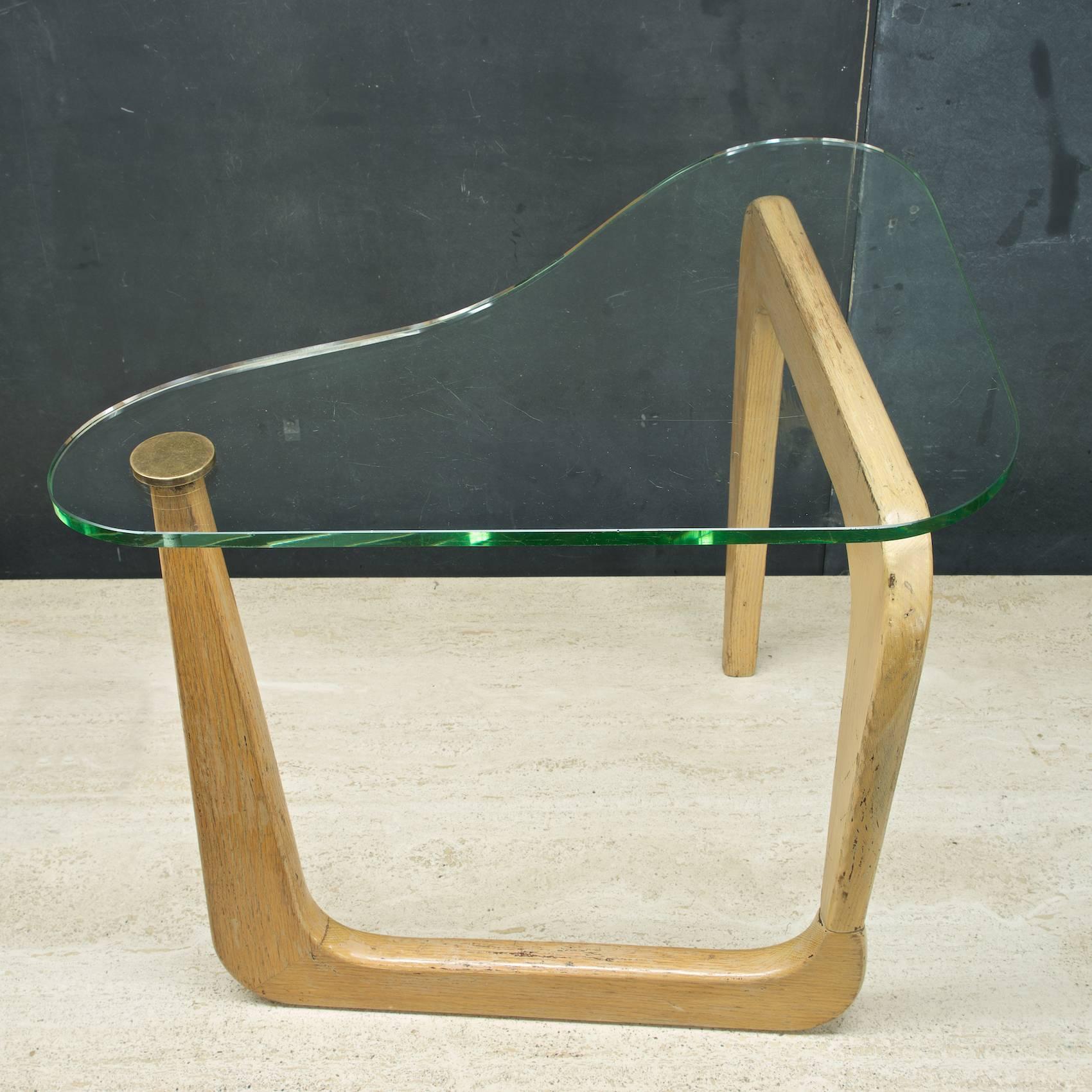The documented designer/maker is unknown. Atomic boomerang glass sofa table. 