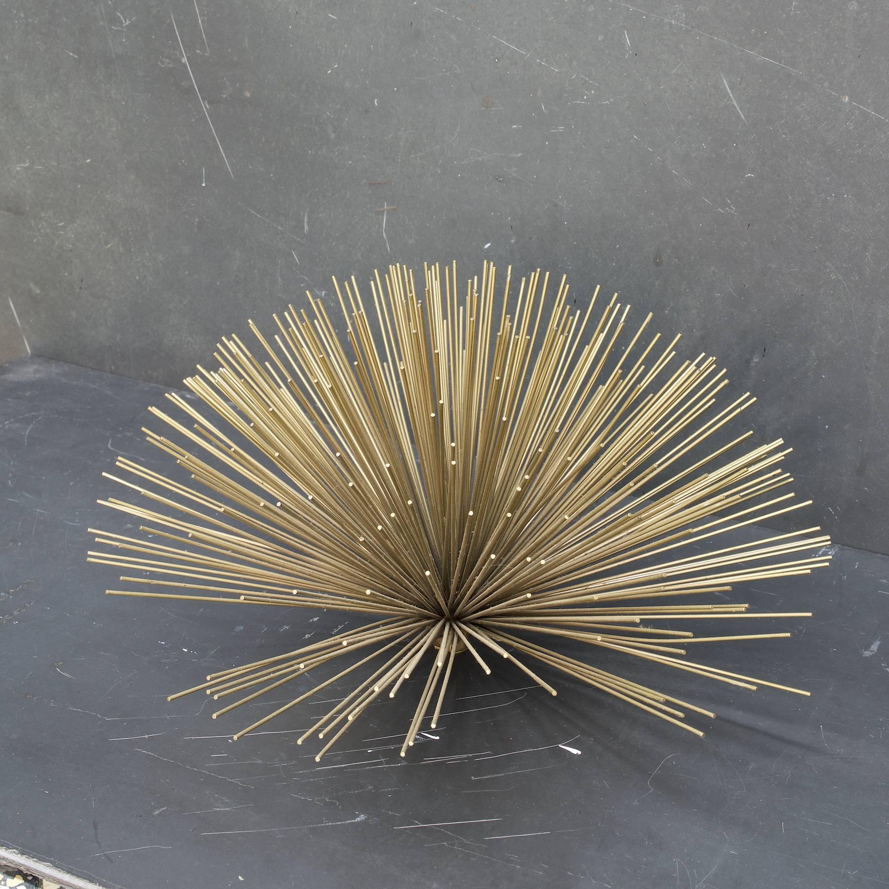 Single pom/ urchin brazened brass wall art with screw-in mount. Not signed and unmarked.