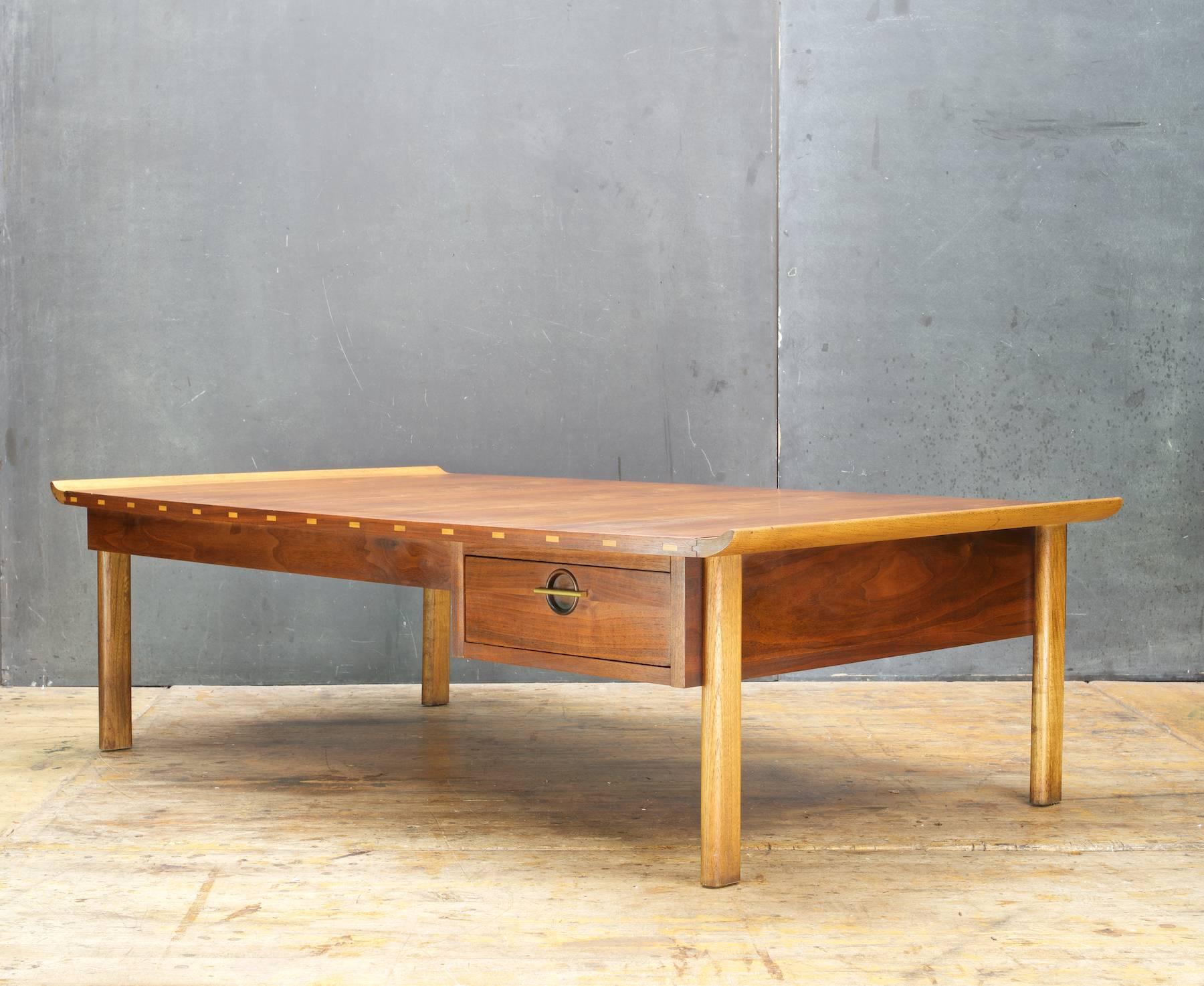 Late 20th Century Asian Styled Mid-Century Modern Flairing and Bowed Coffee Table