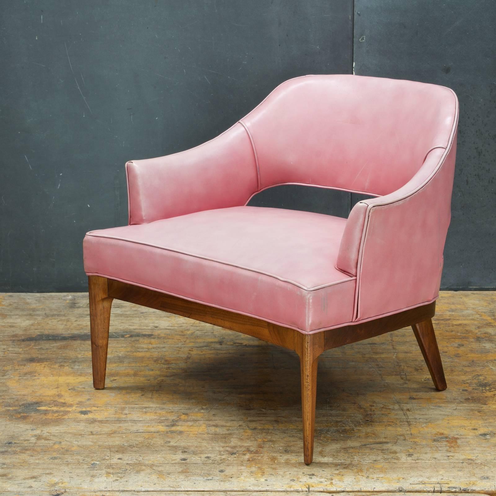 All original, unrestored condition in the original pink naugahyde upholstery. Second chair is available.

Measures: W 28 x D 28, seat H 15¼, arm H 20¼, back H 26½ in.