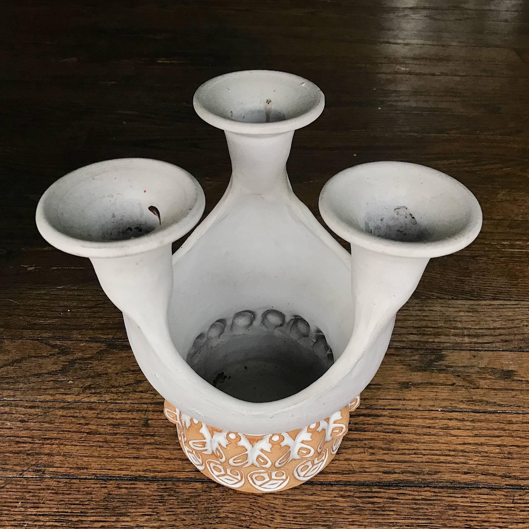 Cottage industry studio pottery production candelabra from Puerto Rico. The company was founded by Raymond Loewy/William Snaith, and Glidden Parker. Pieces were exhibited in Aileen Osborn Webb's America House, NY in the 60s. Many other ceramicists