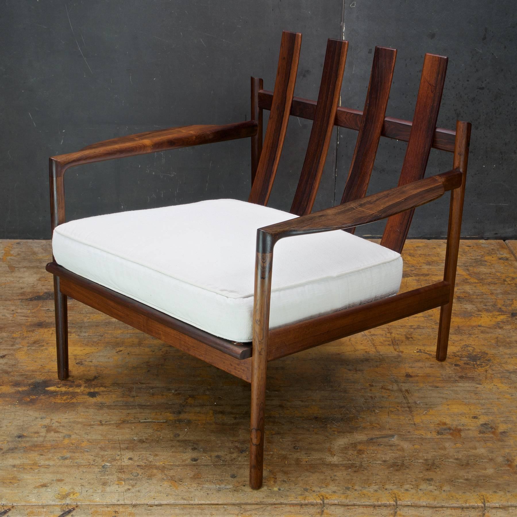 Missing Back Cushion.

All original with original finish. The Frame is Excellent, Strong, Level and Sturdy. Original seat cushion a bit dingy. Imported from Denmark by Selig. No back cushion.

W 29.75 x D 27.75 x seat H 16 x arm H 20 x back H 28.75