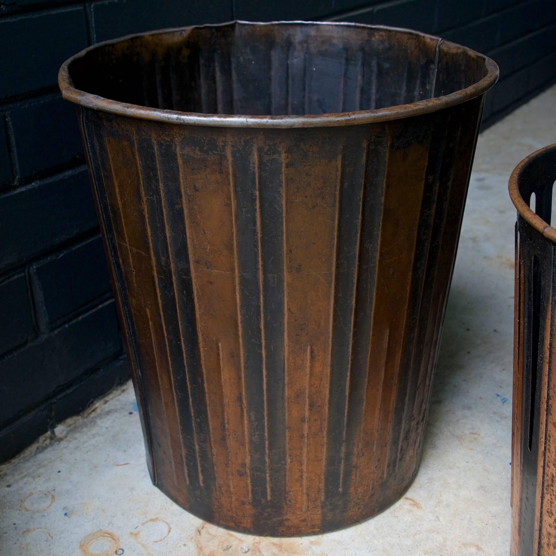 Japanned finished copper factory office trash cans wastebaskets. Measures: Two large D 13.25 x H 14.25 in.
One small D 11.25 x H 12.25 in.