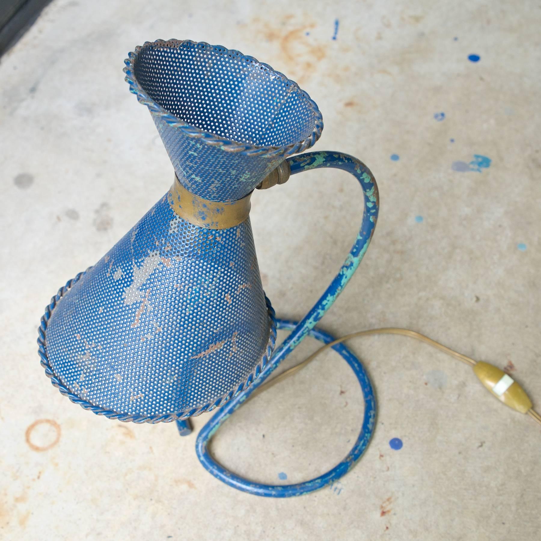 French table light by Mathieu Mategot (1910-2001), produced by Atelier Mategot in the 1950s. Adjustable Head with blue and grey varnishes on perforated diabolo metal double cone shade. 

Original Finish with original European cord and socket.  Could