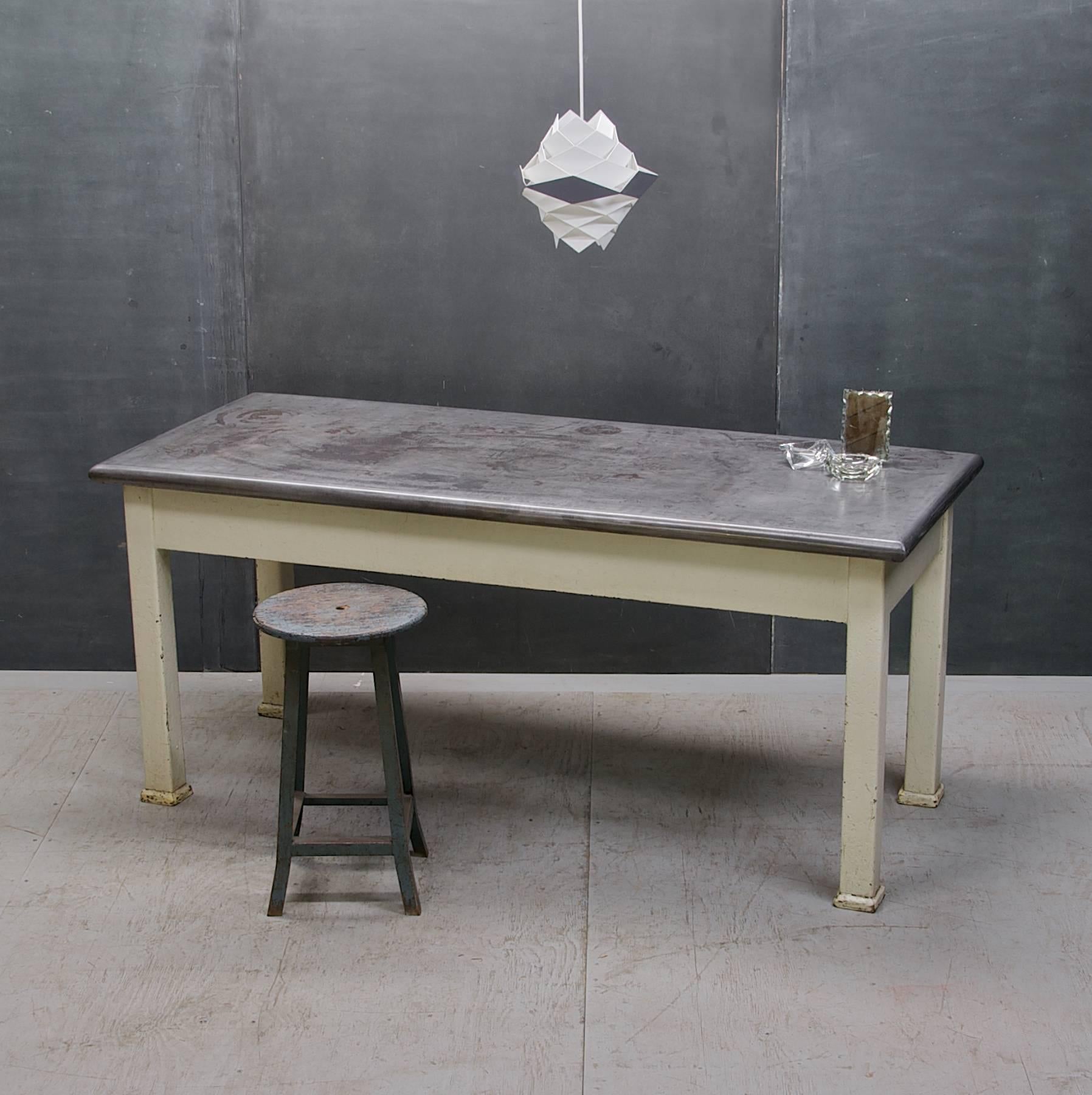 An all steel constructed table with, all tight and sturdy, will with stand weight of commercial cooking tools. W: 72½ X 30½ X 32 in. Ground to bottom of table skirt is 24¼ in.