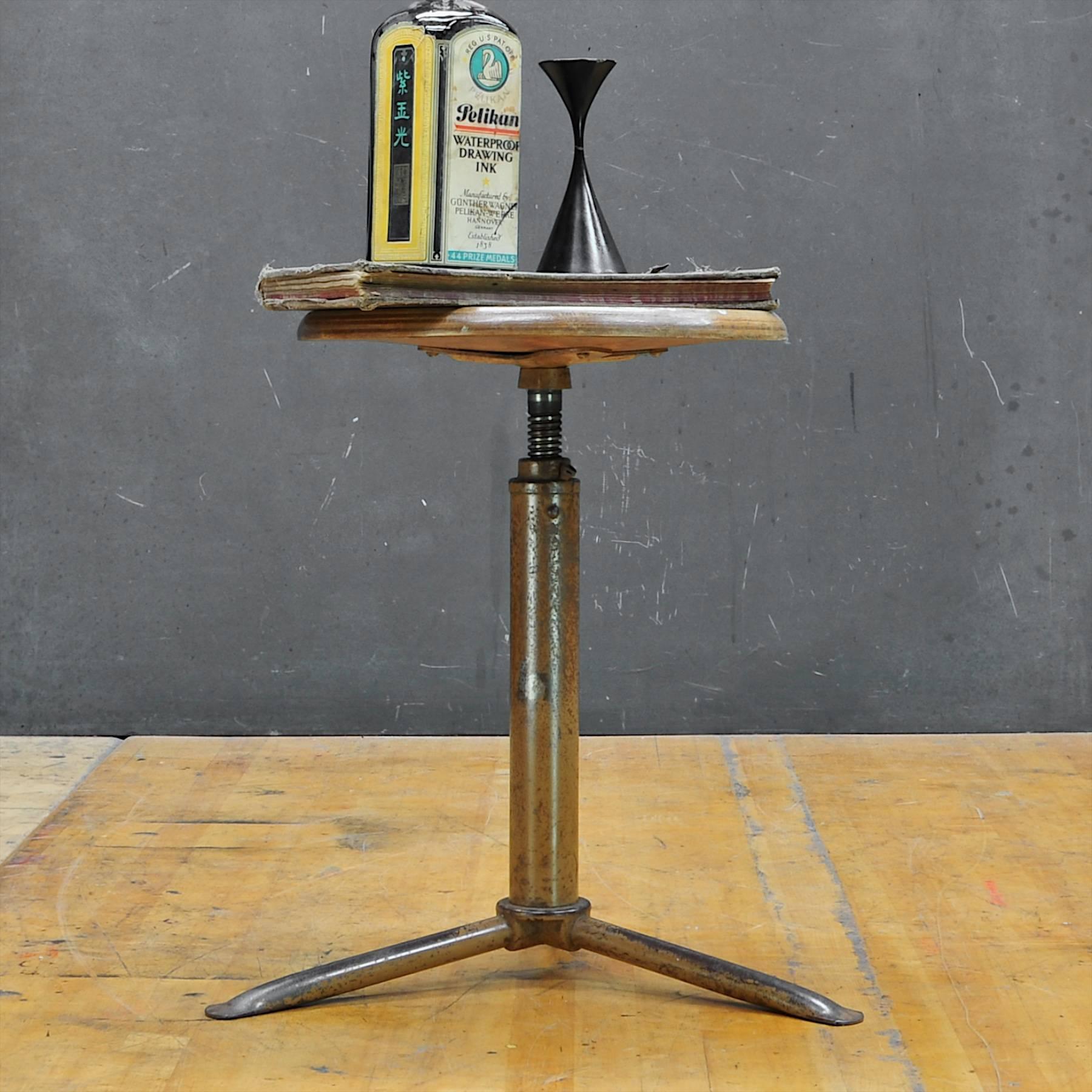 Art Professor's Workshop spinner stool. Cast Iron and Steel Tripod Pedestal. Very Good Vintage Condition, Sturdy, Level, and smoothly Functional.
