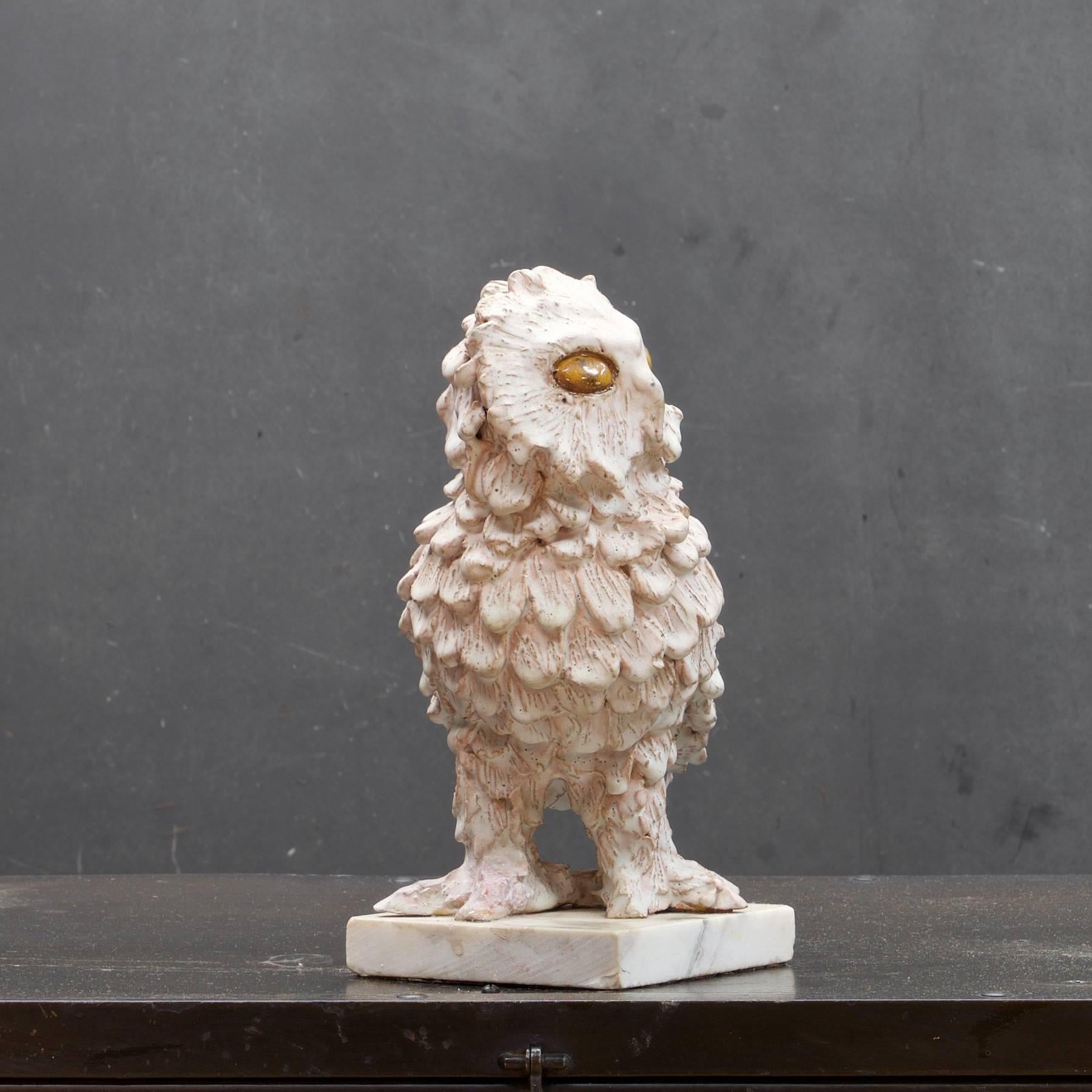 ceramic owl sculpture