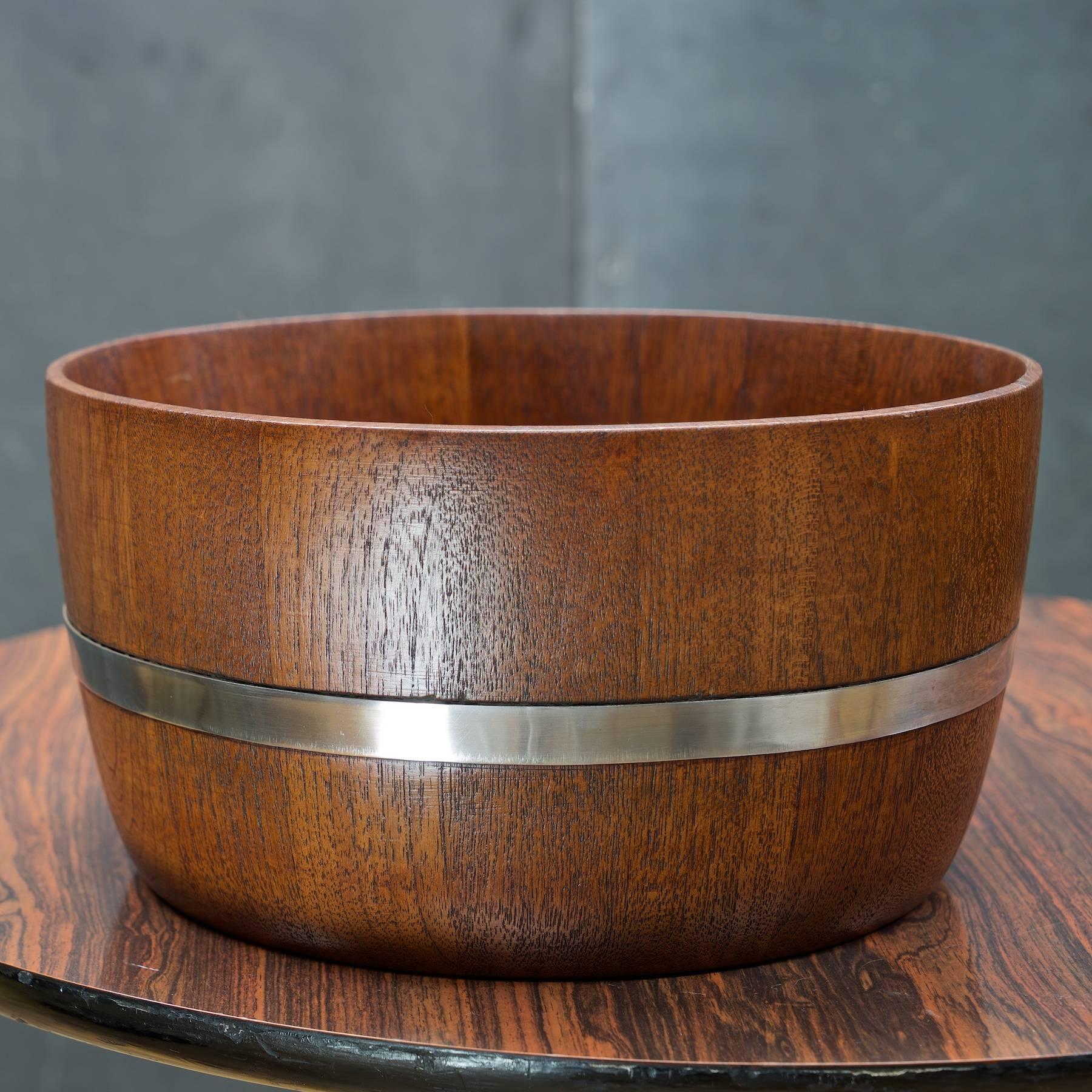 Barrel bowl diameter: 10.88 in.
Early and rare teak bowl by Nissen-Quistgaard. Burnished, JHQ (Pre-1962) Denmark (Pre-1954.) 

Salad tongs L: 15 x W: 2.25 x H: 1 in.
Denmark, 1960. Exceptional original set two rare Quistgaard solid teak serving