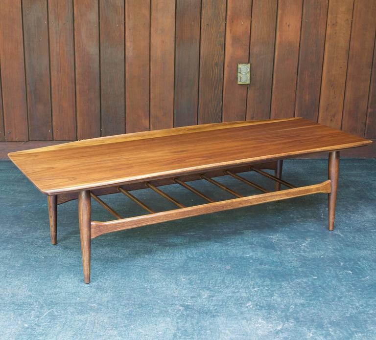 Long Winged Mad Men Coffee Table With Magazine Rack Shelf At 1stdibs Mid Century Modern Long Winged Mad Men Coffee Table With Magazine Rack Shelf For