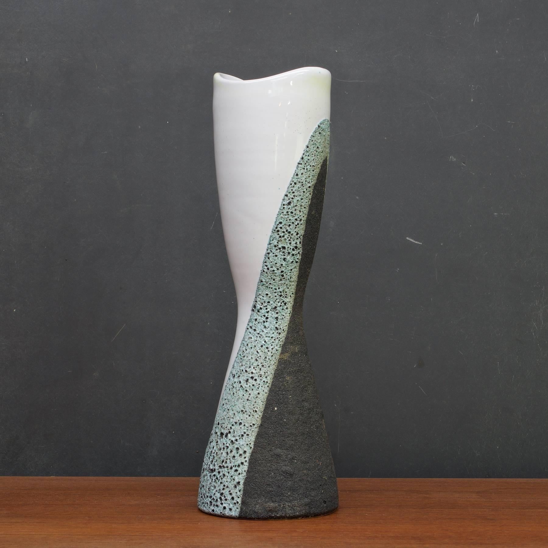Spectacular form and layered glazes, with undulating contour and top, this vase by Ettore Sottsass made in collaboration with Aldo Londi, Bitossi/Raymor. This Sottsass glaze pattern/design was used on lamps and decorative objects in the 1960s.