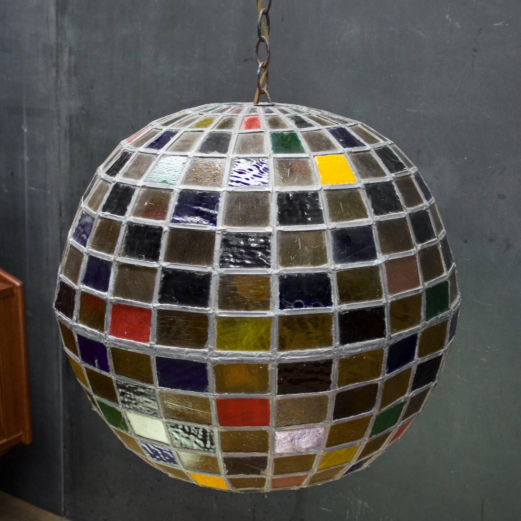 Very heavy, overbuilt lamp. super fun vintage multicolored globe chandelier. Round hatch on bottom on ball to change out a regular sized light bulb, 200 max watt. 

Please note this item is showing a lots of wear, but we feel it is very worthy of