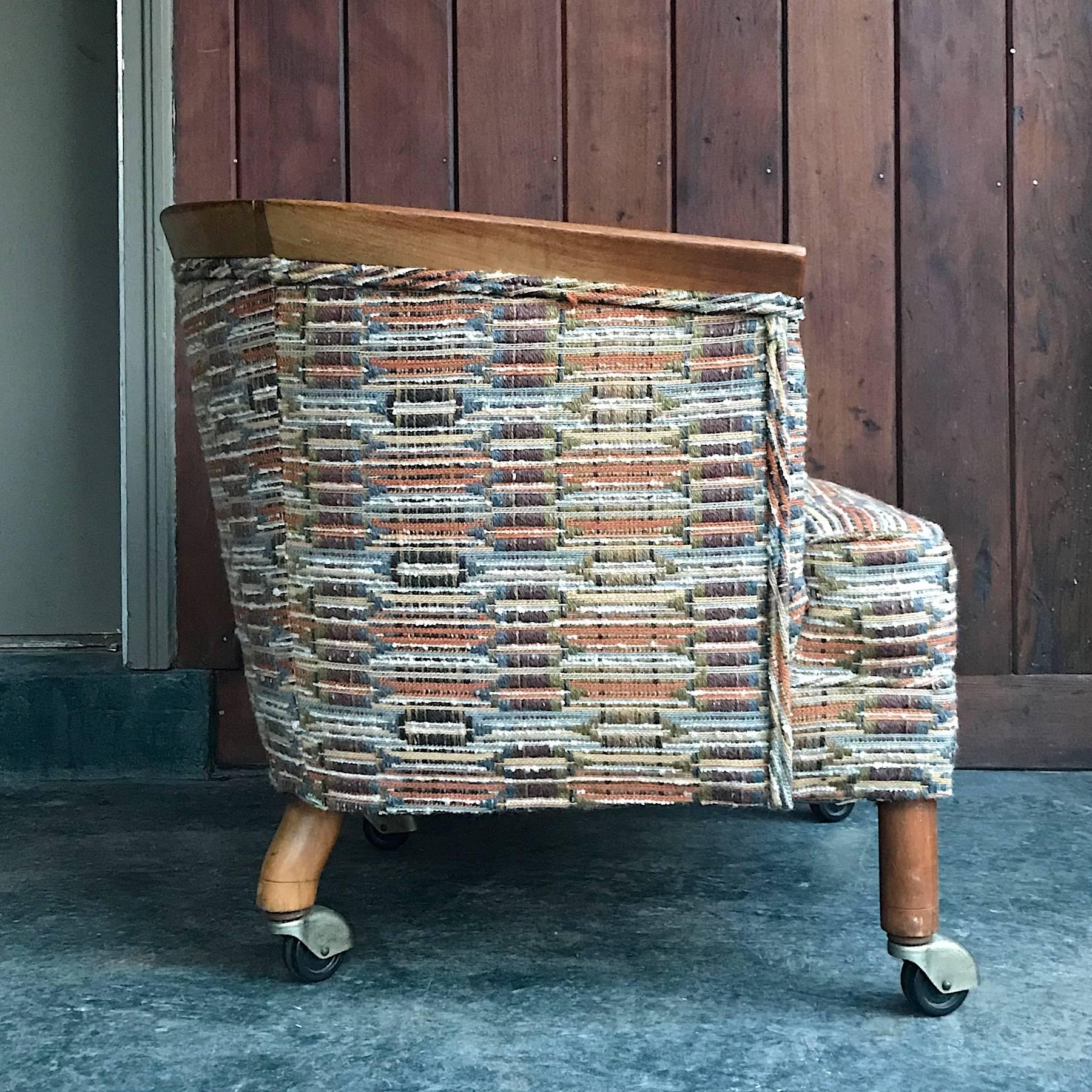 All 1950 original chair, in the original fabric. The fabric is a thick woven pattern in the manner of Maria Kipp. The chair frame/skeleton is strong, tight framed, very comfortable.  Foam is still great, usable as-is in original state.

Measure: W