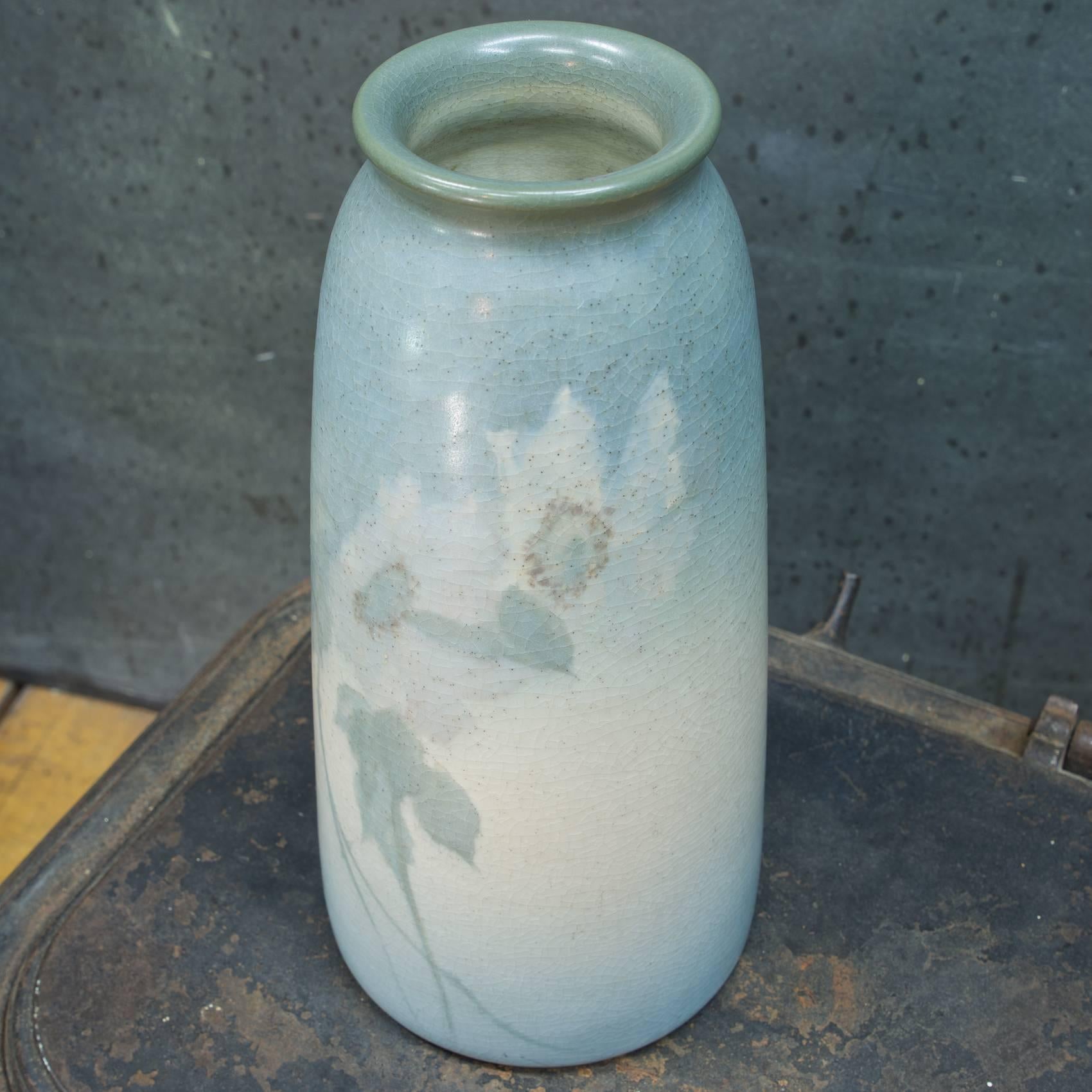 Rookwood Vase, Monumental tapered shape in a Vellum glaze with a beautiful wild rose design, executed by Fred Rothenbusch in 1914, No.1653.

Bottom Dia: 4.75 x Top Dia: 3 x H: 10 in.
