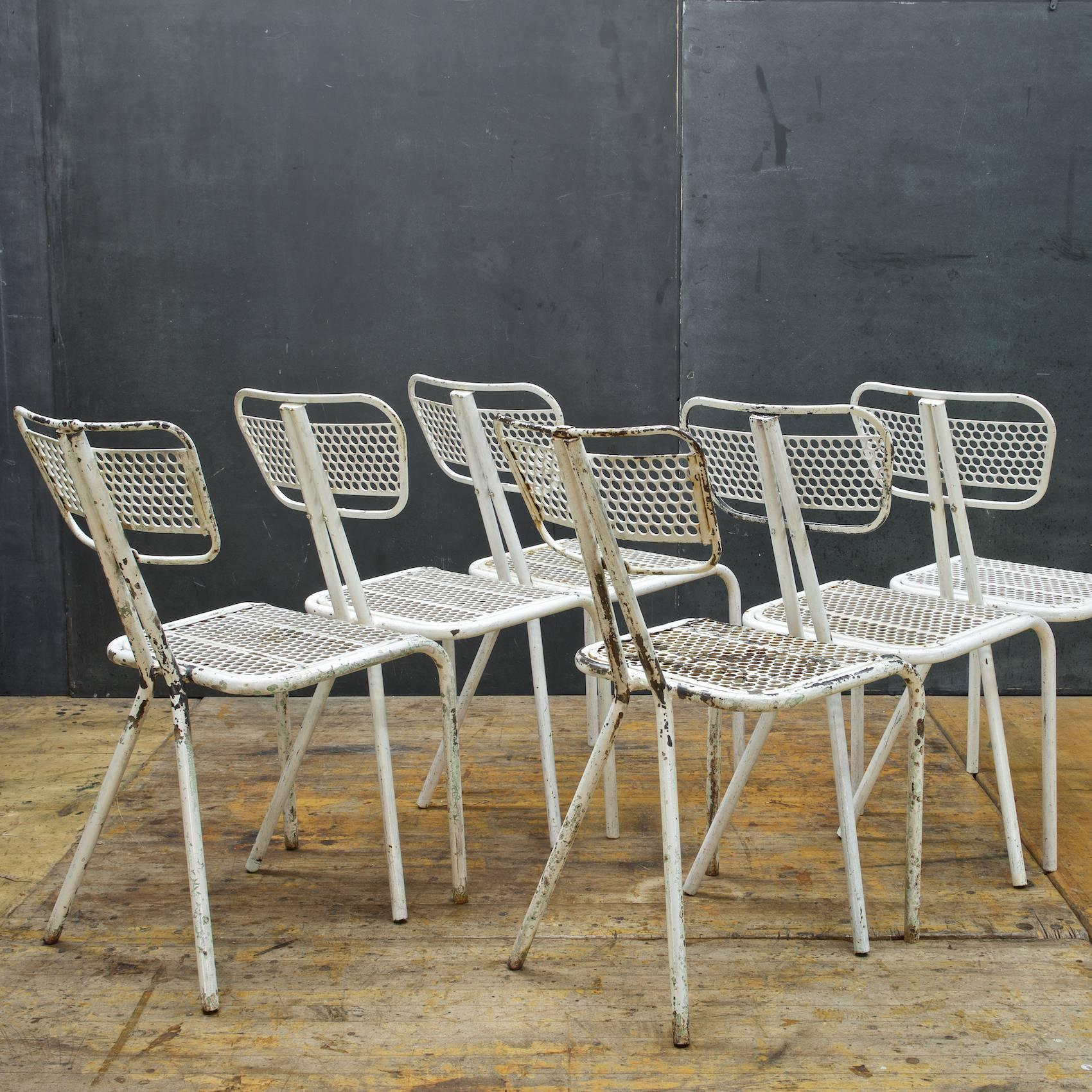 Post-war designed French Industrial/Mid-Century Modern Cafe Chairs.

