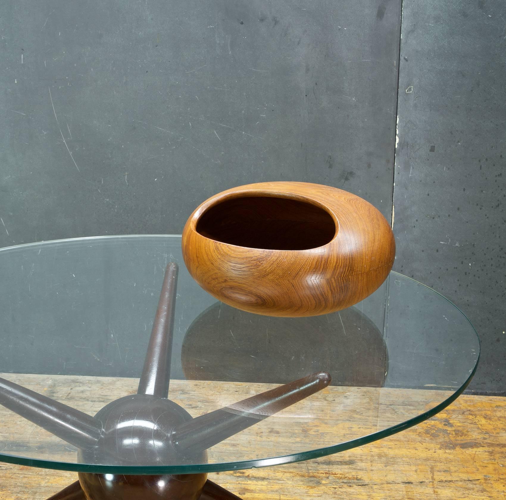 Rare bowl designed and made by Sigvard Nilsson, Söwe konst. Made from solid teak and sculpted by hand in Sweden, c.1951. Centerpiece of Nut Bowl or Covered salad serrving bowl. 

An Iconic Scandinavian design. In the manner of all the greats of the
